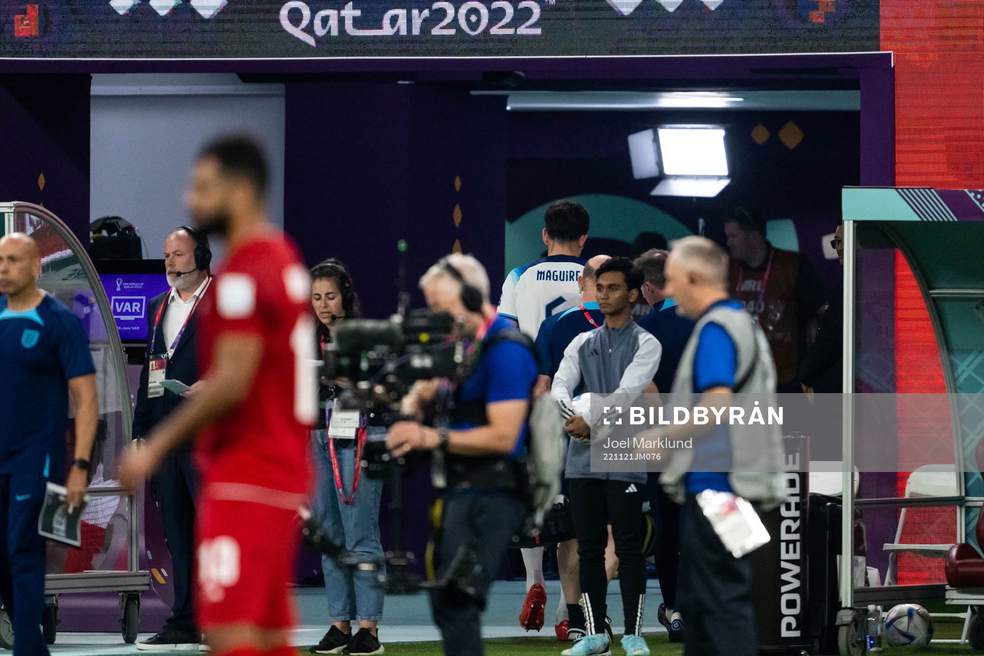Harry Maguire of England receives medical attention