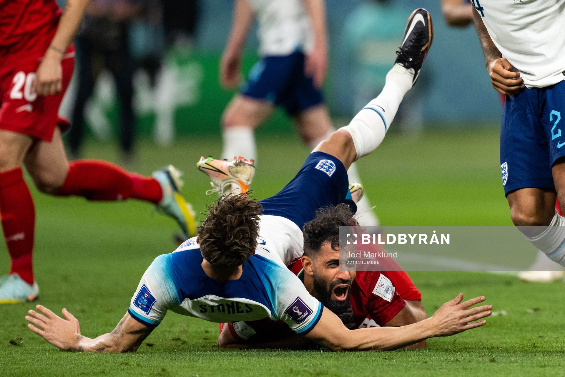 John Stones of England and Hossein Kanani of Iran