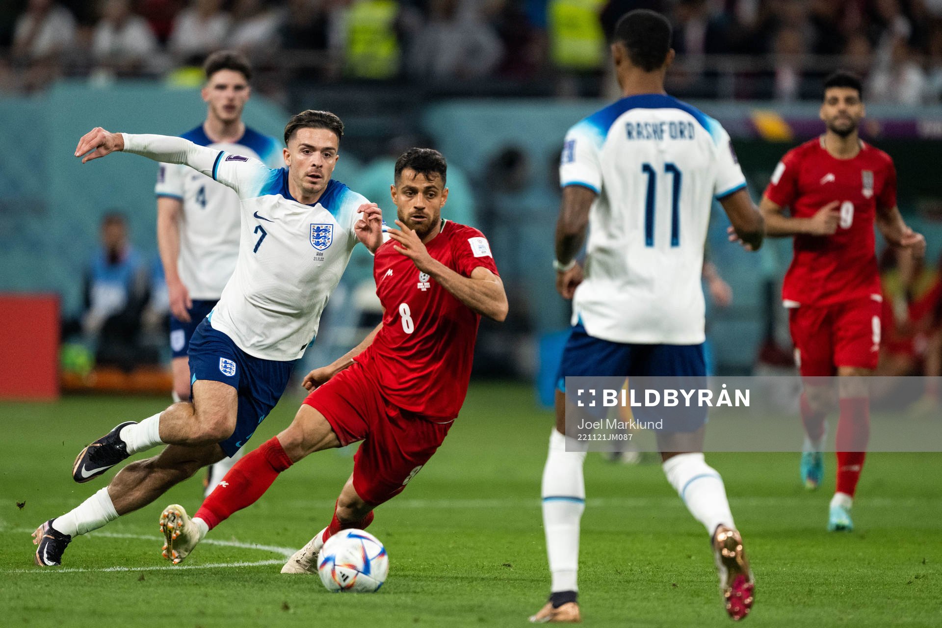Jack Grealish of England and Morteza Pouraliganji of Iran