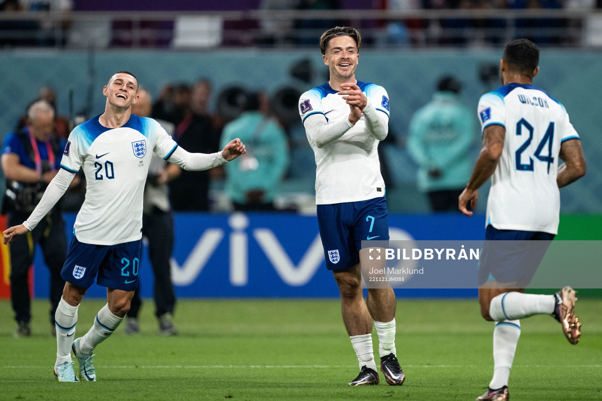 Phil Foden, Jack Grealish and Callum Wilson of England celebrate 6-1 during the FIFA World Cup 2022 football match between England and Iran on November 21, 2022 in Doha.