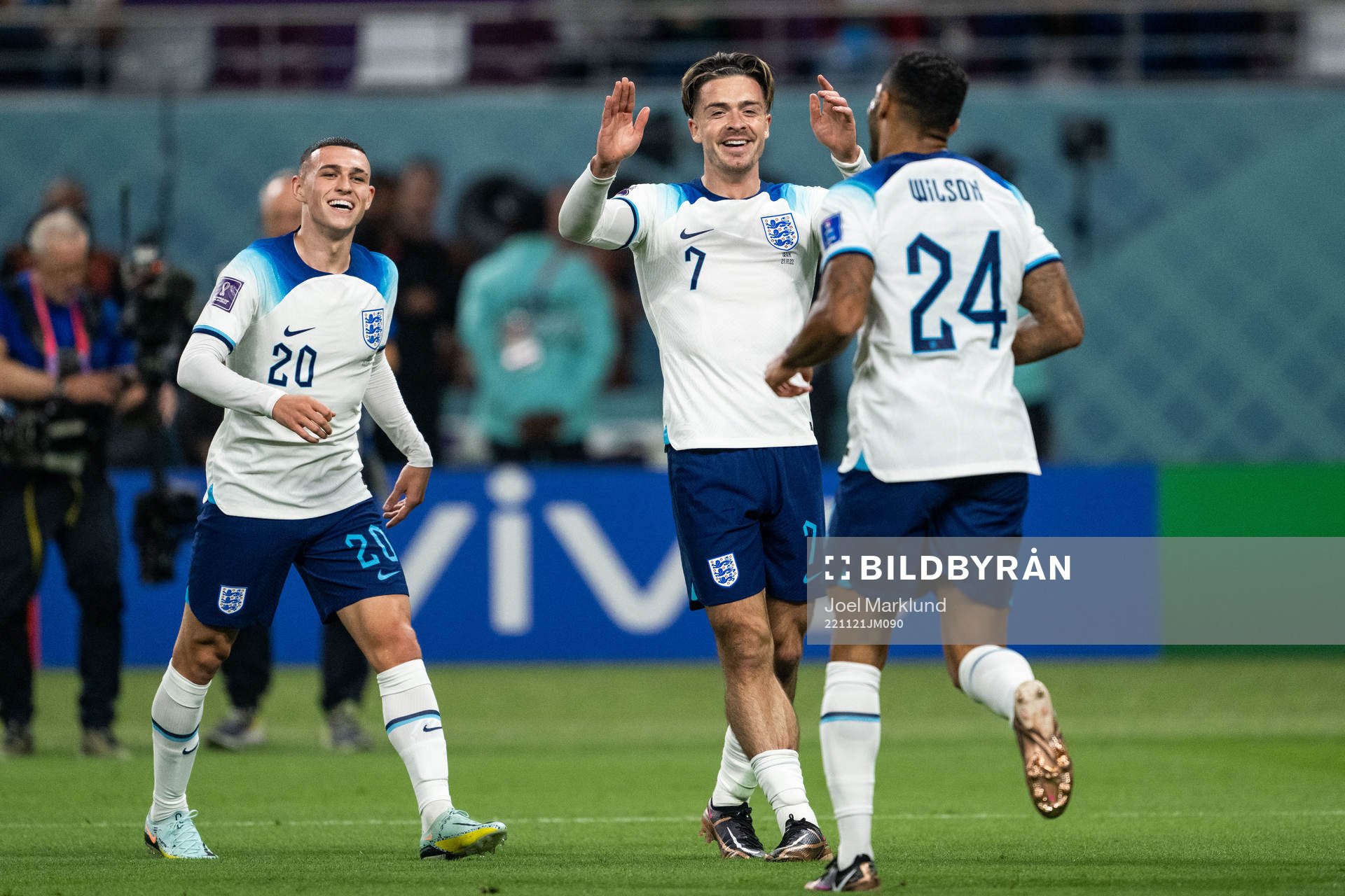 Phil Foden, Jack Grealish and Callum Wilson of England celebrate 6-1 during the FIFA World Cup 2022 football match between England and Iran on November 21, 2022 in Doha.