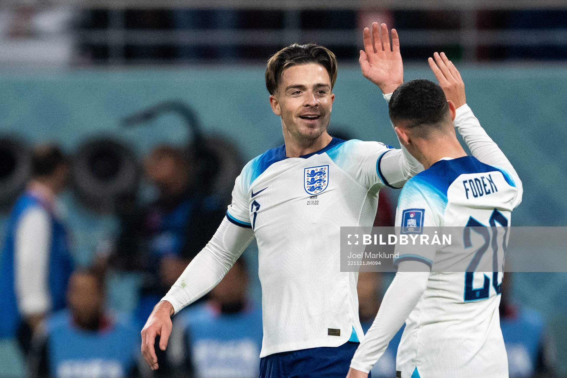 Jack Grealish and Phil Foden of England celebrate 6-1
