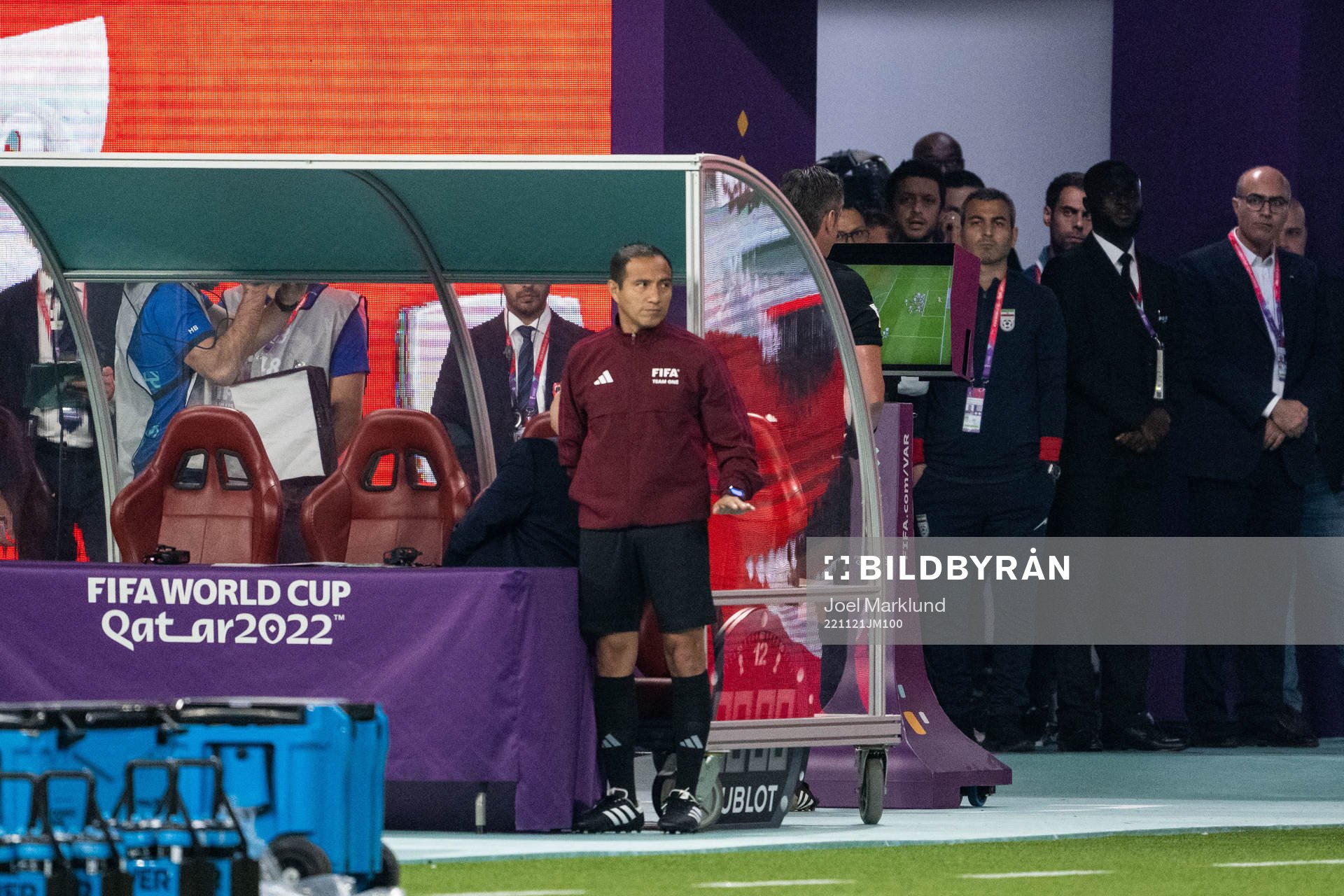 Referee Raphael Claus with a VAR review