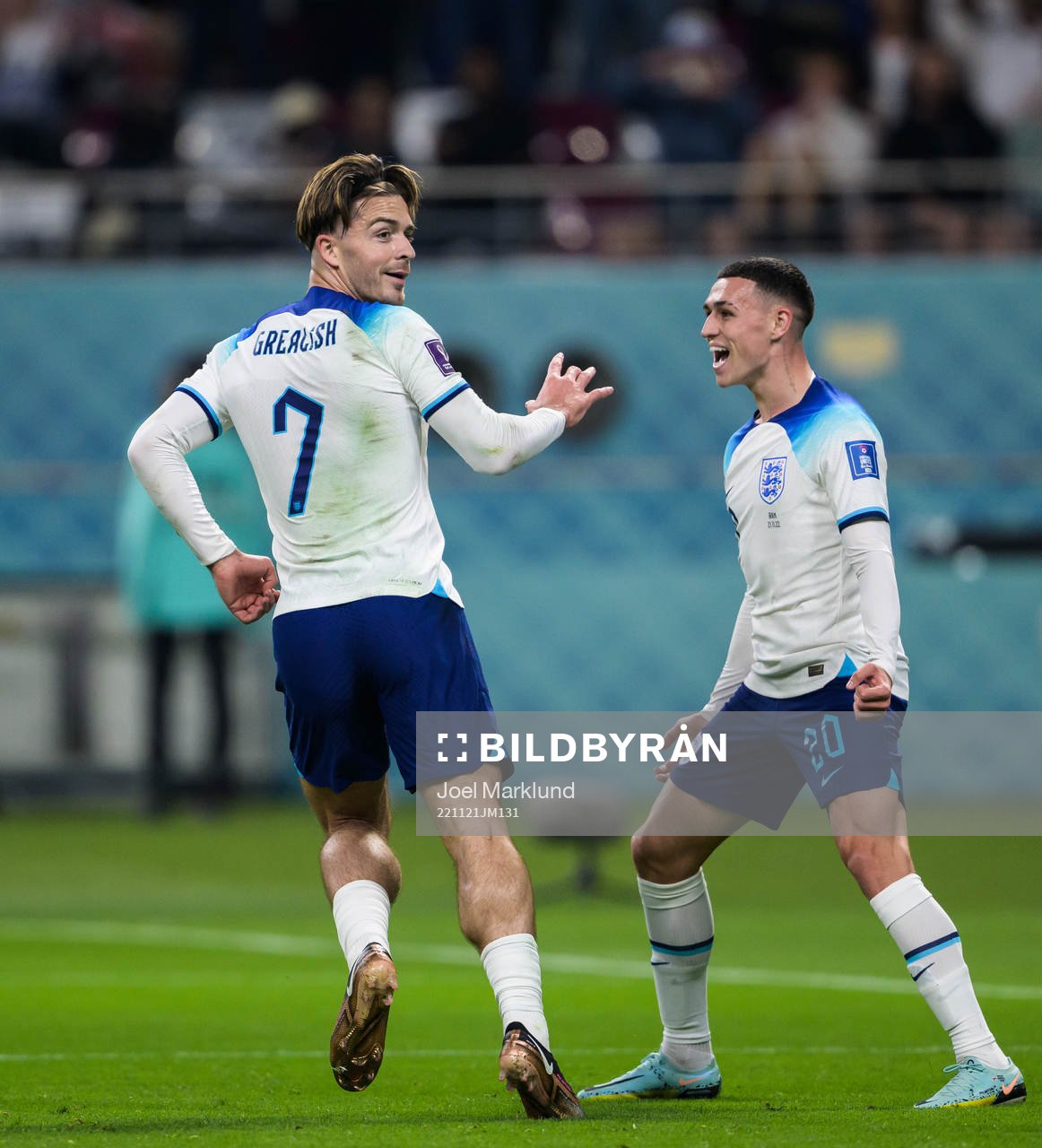 Jack Grealish and Phil Foden of England celebrate the 6-1