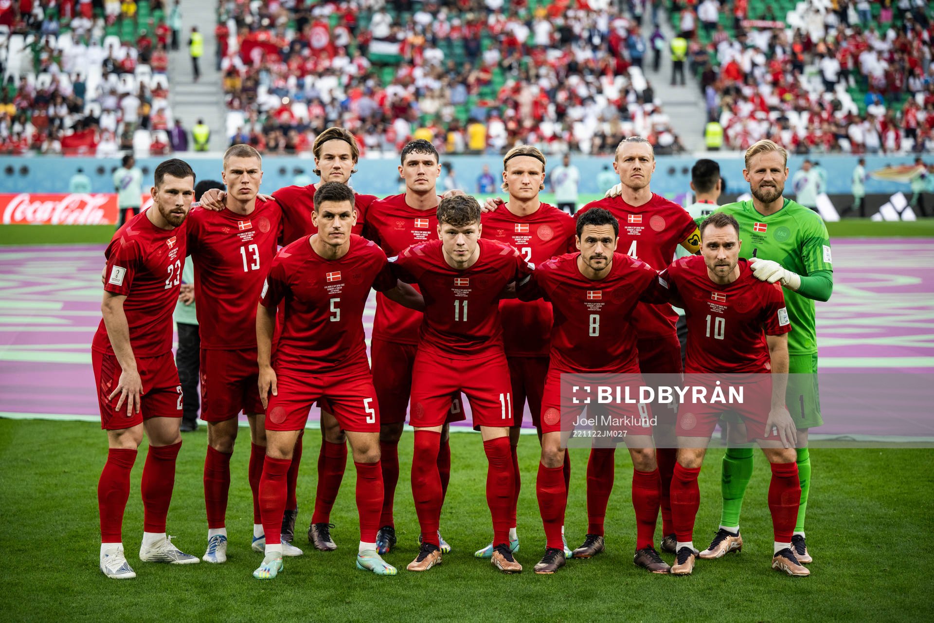 Starting eleven of Denmark pose for a team photo ahead of the FIFA World Cup 2022 football match between Denmark and Tunisia on November 22, 2022 in Doha.