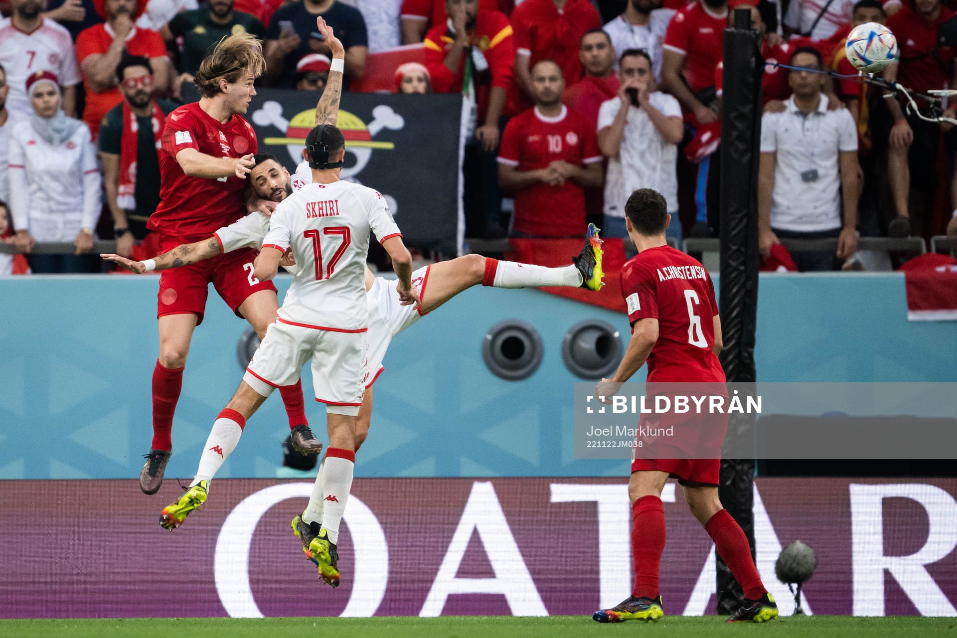 Joachim Andersen of Denmark against Dylan Bronn and Ellyes Skhiri of Tunisia during the FIFA World Cup 2022 football match between Denmark and Tunisia on November 22, 2022 in Doha.