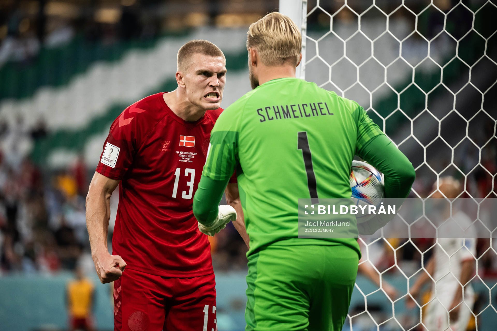 Rasmus Kristensen and goalkeeper Kasper Schmeichel of