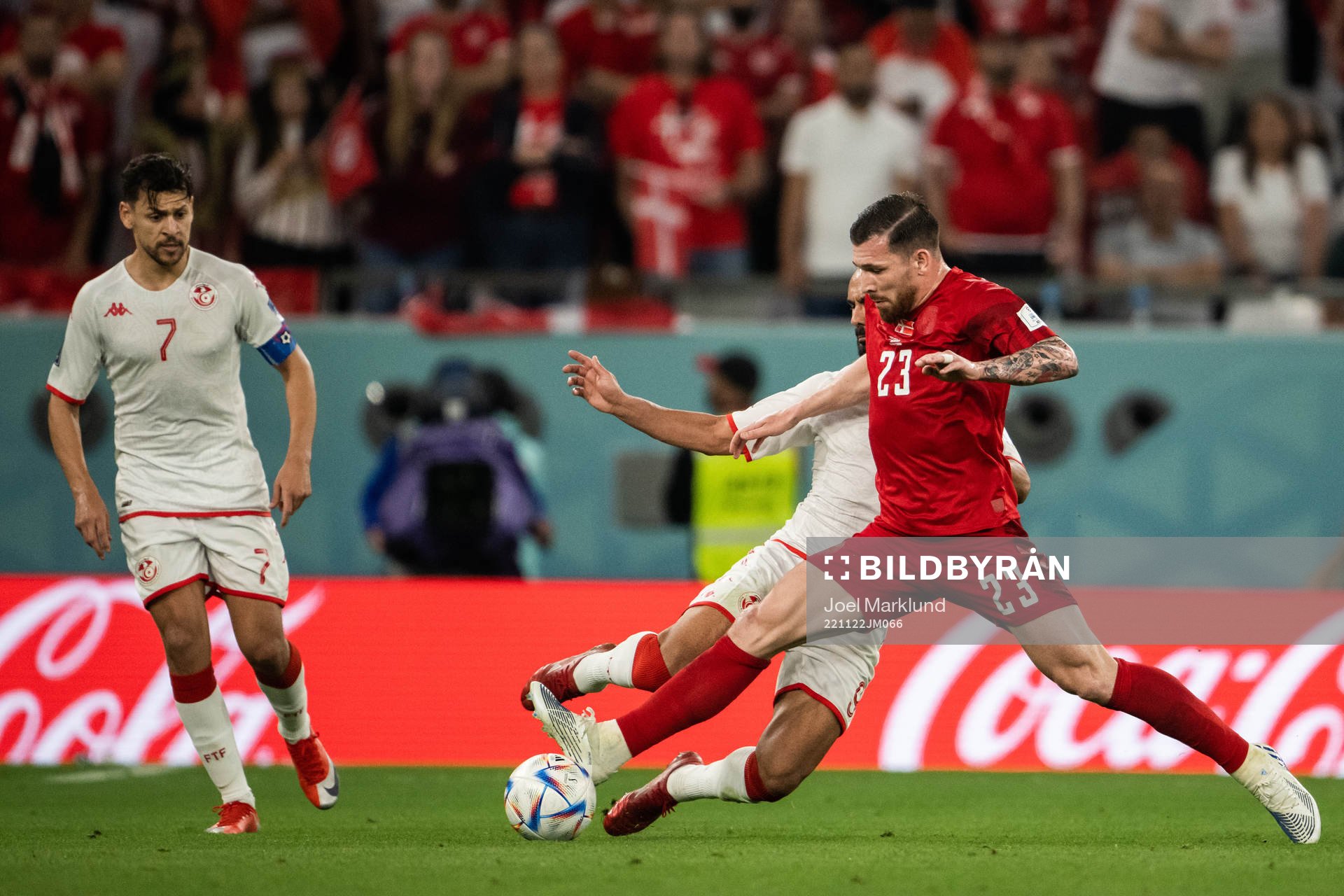 Issam Jebali of Tunisia and Pierre-Emile Højbjerg of Denmark during the FIFA World Cup 2022 football match between Denmark and Tunisia on November 22, 2022 in Doha.