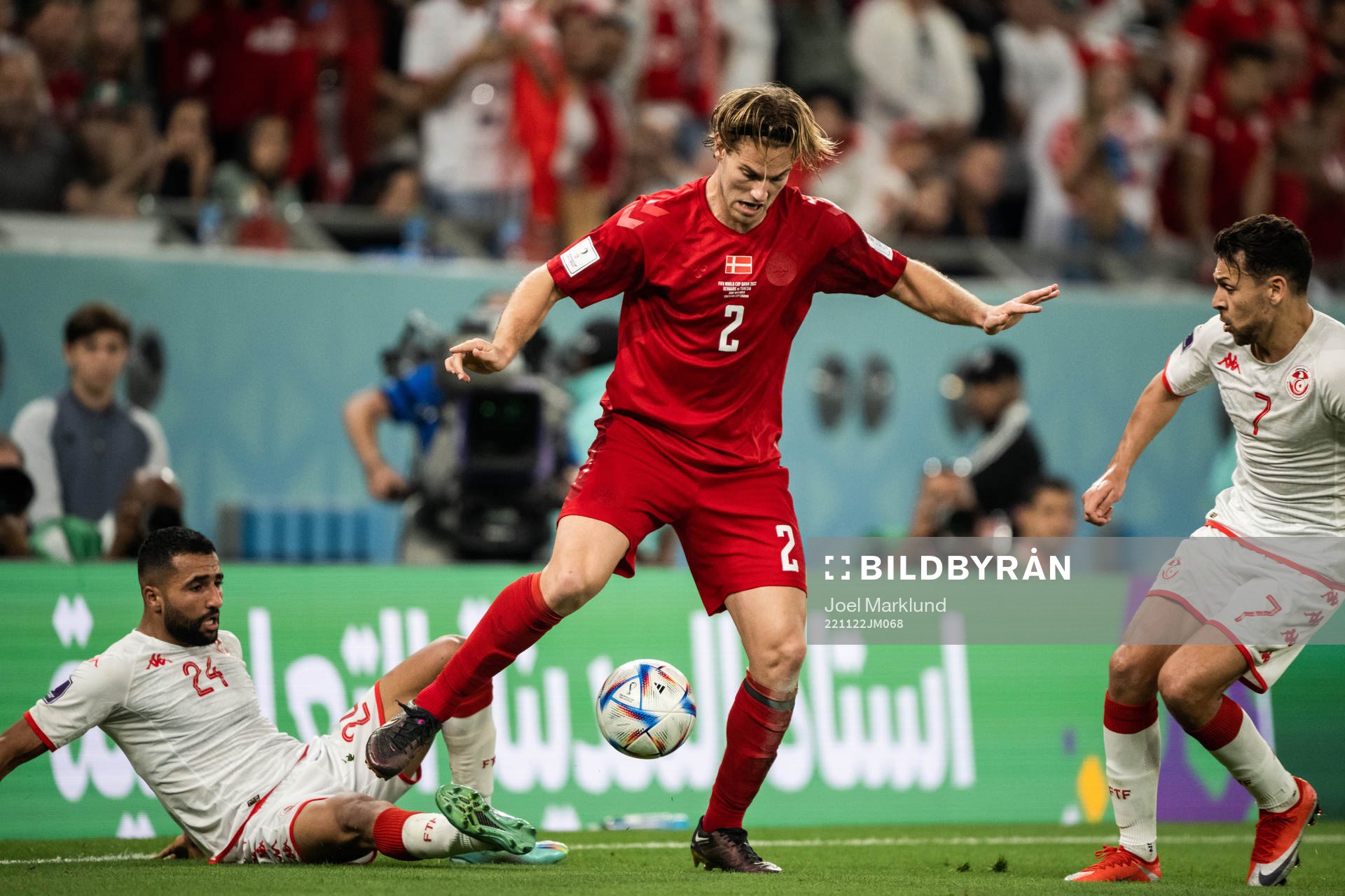 Joachim Andersen of Denmark against Ali Abdi and Youssef
