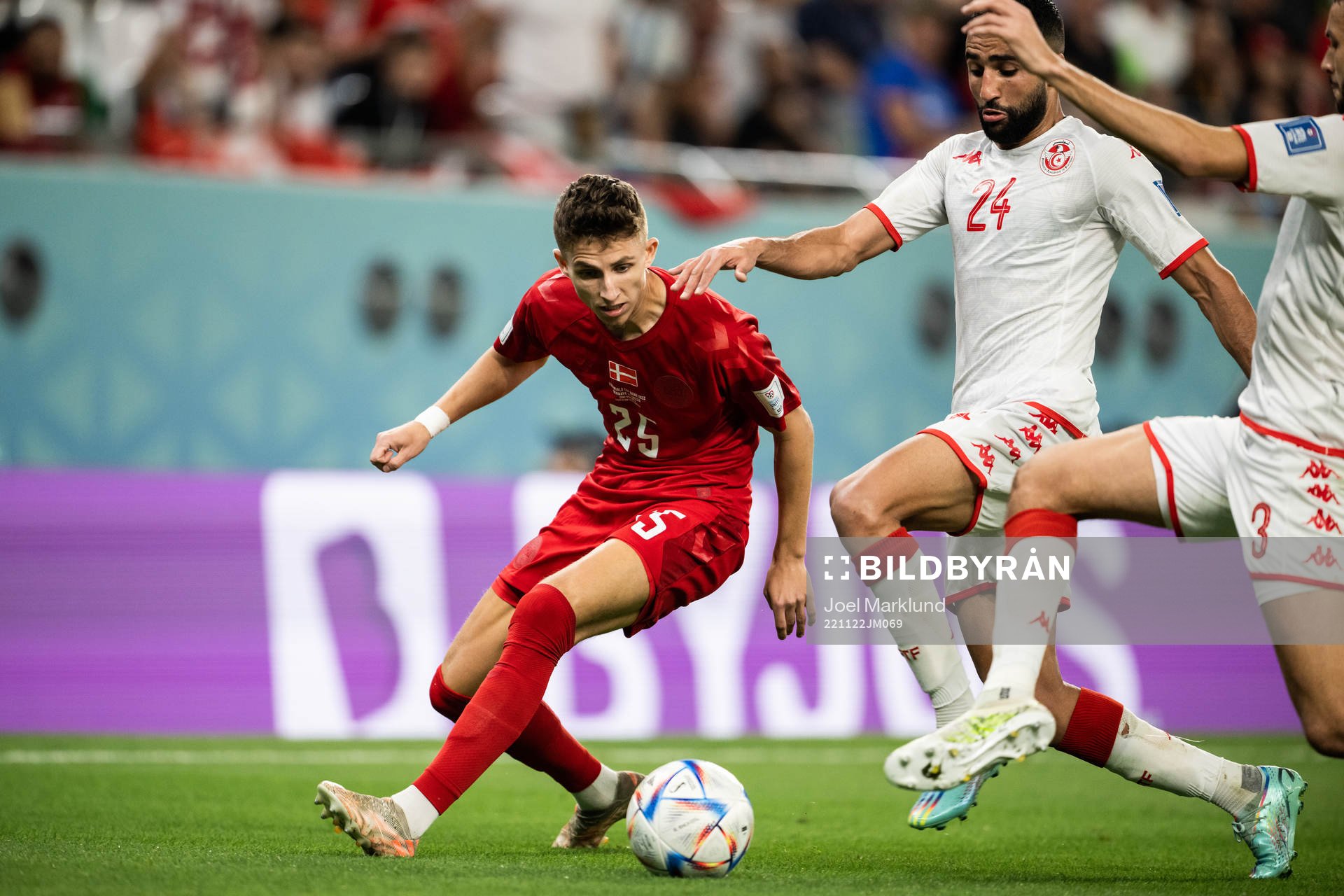 Jesper Lindstrøm of Denmark against Ali Abdi and Montassar