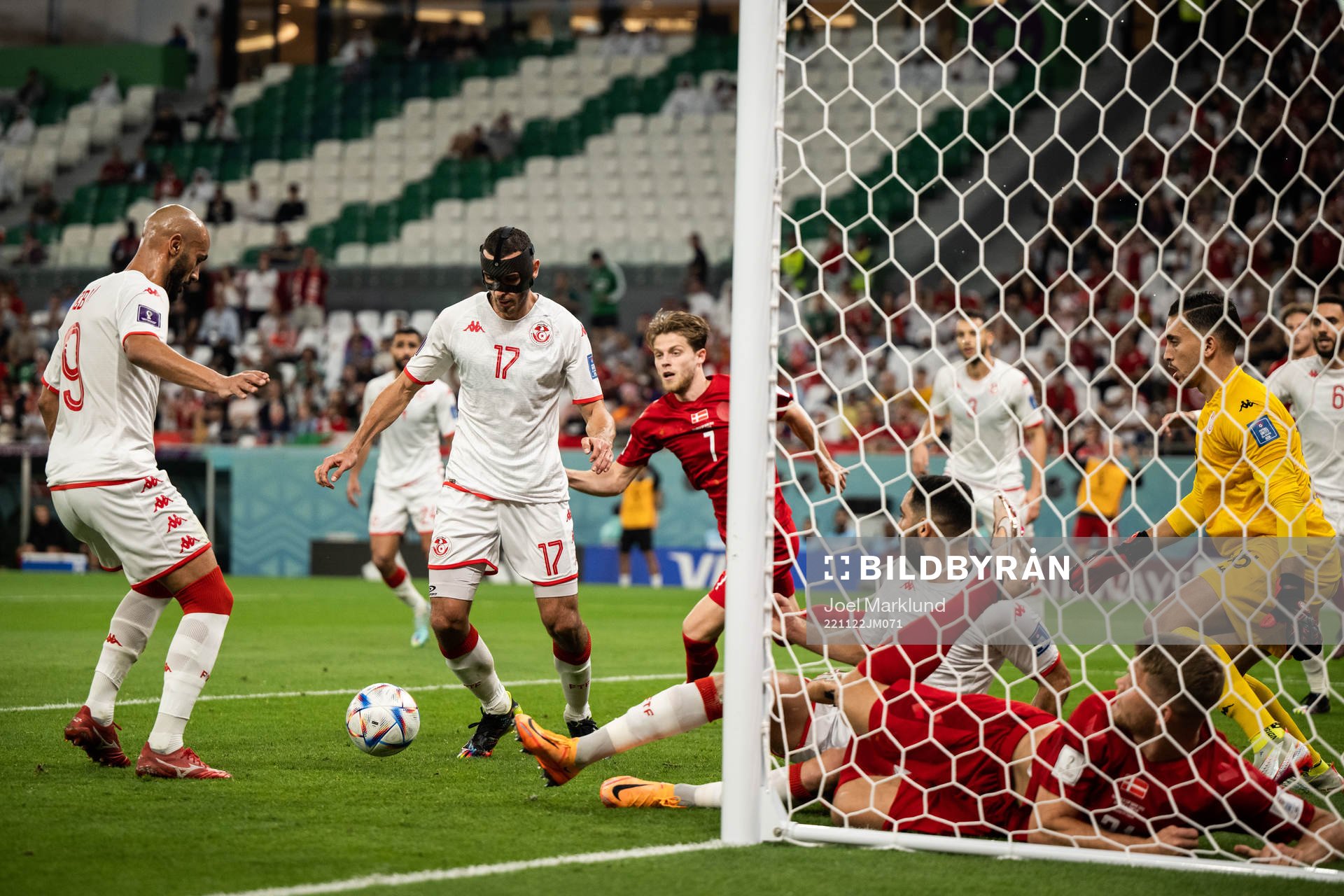 Issam Jebali and Ellyes Skhiri of Tunisia during the FIFA World Cup 2022 football match between Denmark and Tunisia on November 22, 2022 in Doha.