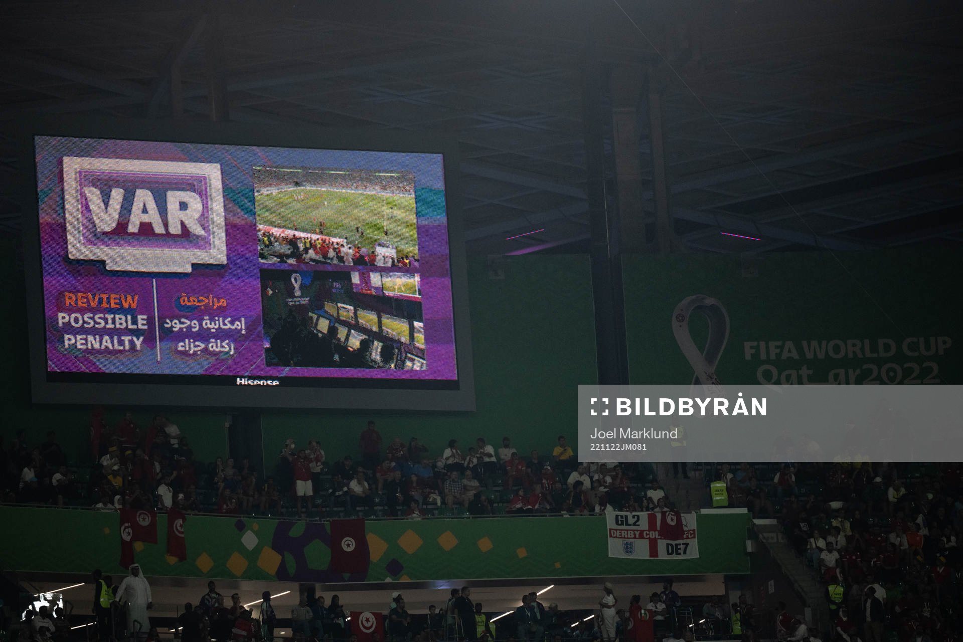 VAR review for a possible penalty during the FIFA World Cup 2022 football match between Denmark and Tunisia on November 22, 2022 in Doha.