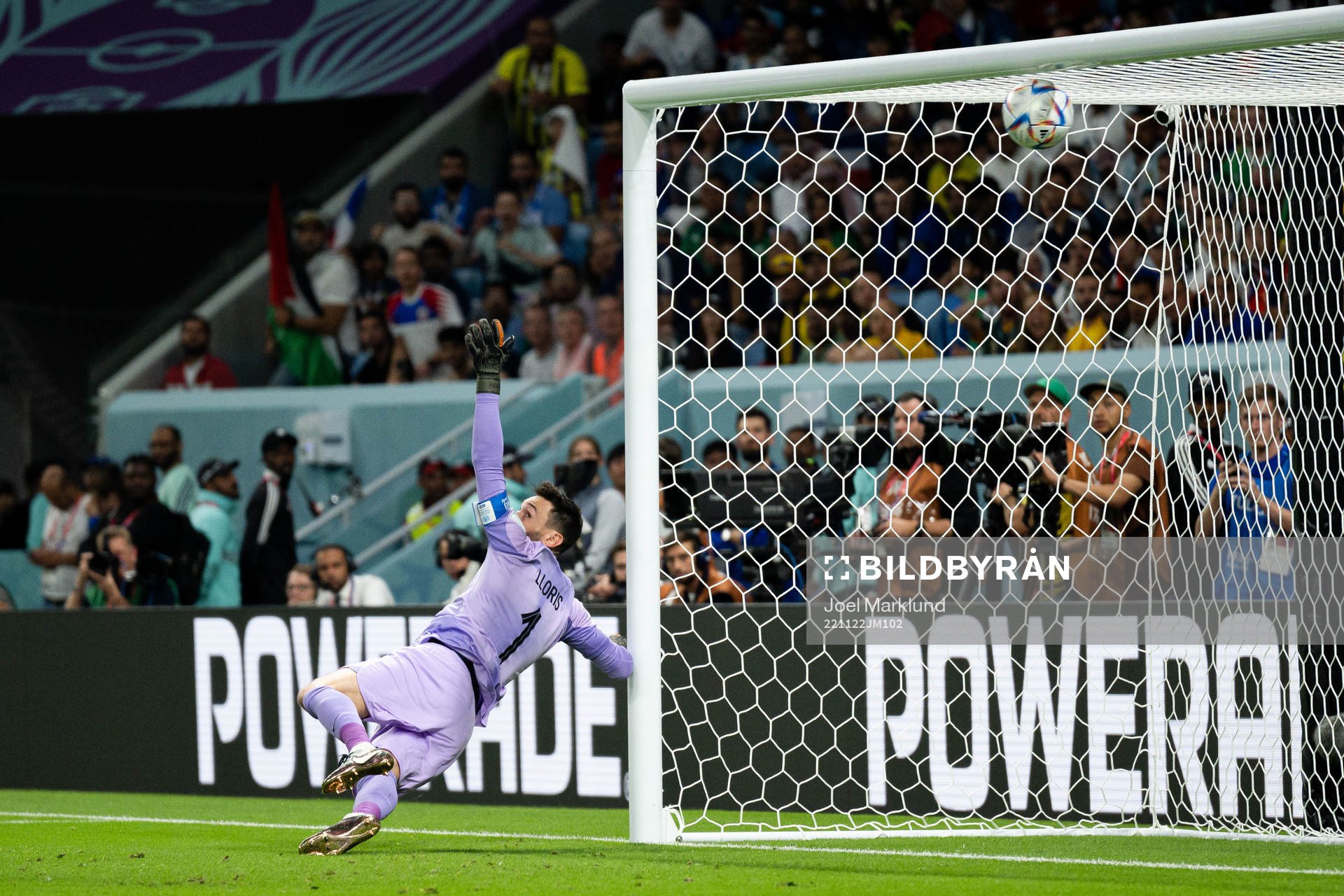 Craig Goodwin of Australia, not pictured, scores the 0-1 goal behind goalkeeper Hugo Lloris of France during the FIFA World Cup 2022 football match between France and Australia on November 22, 2022 in Doha.