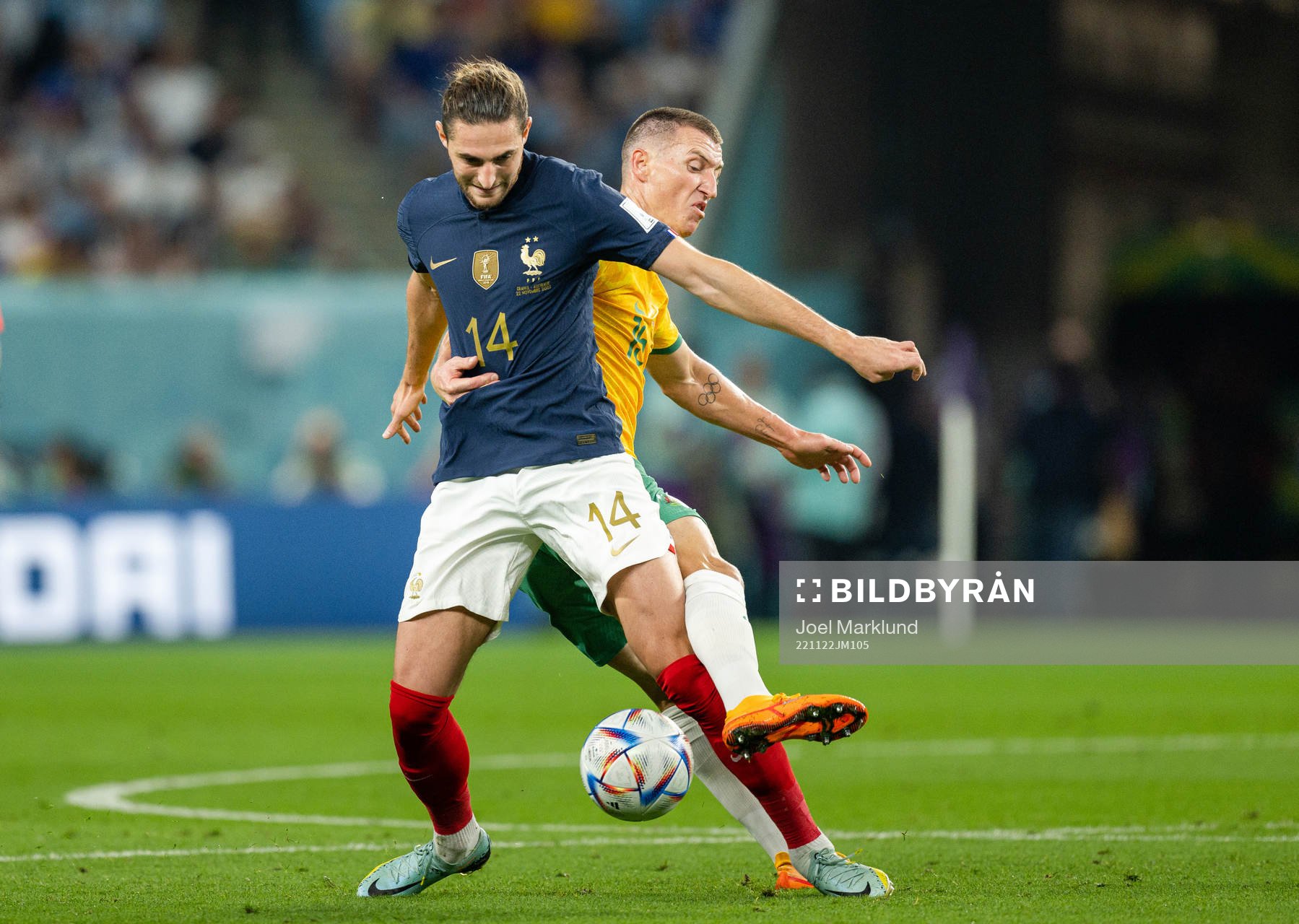 Adrien Rabiot of France and Mitchell Duke of Australia