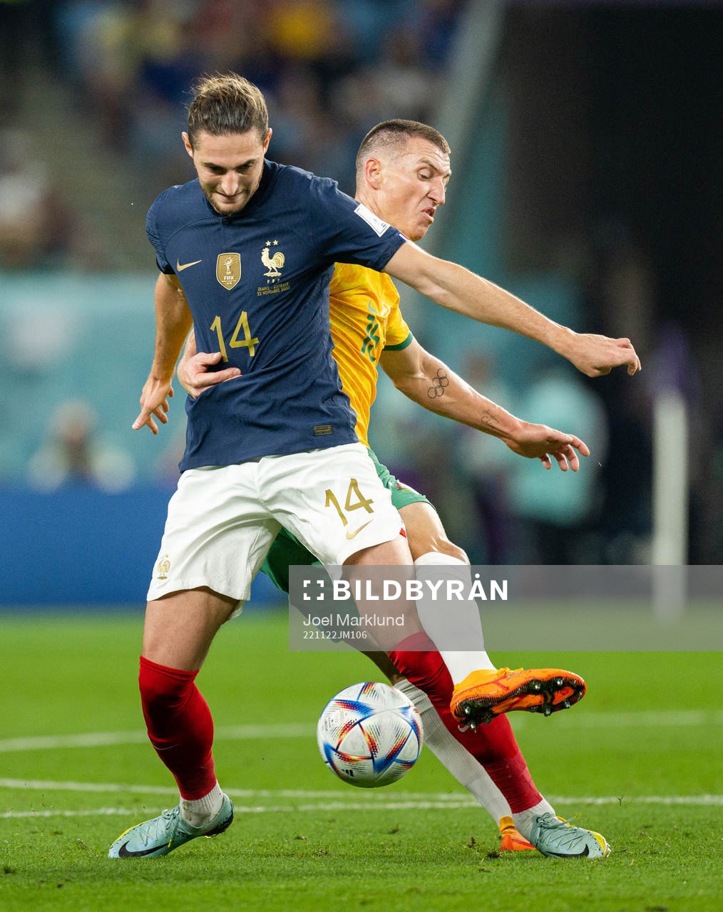 Adrien Rabiot of France and Mitchell Duke of Australia