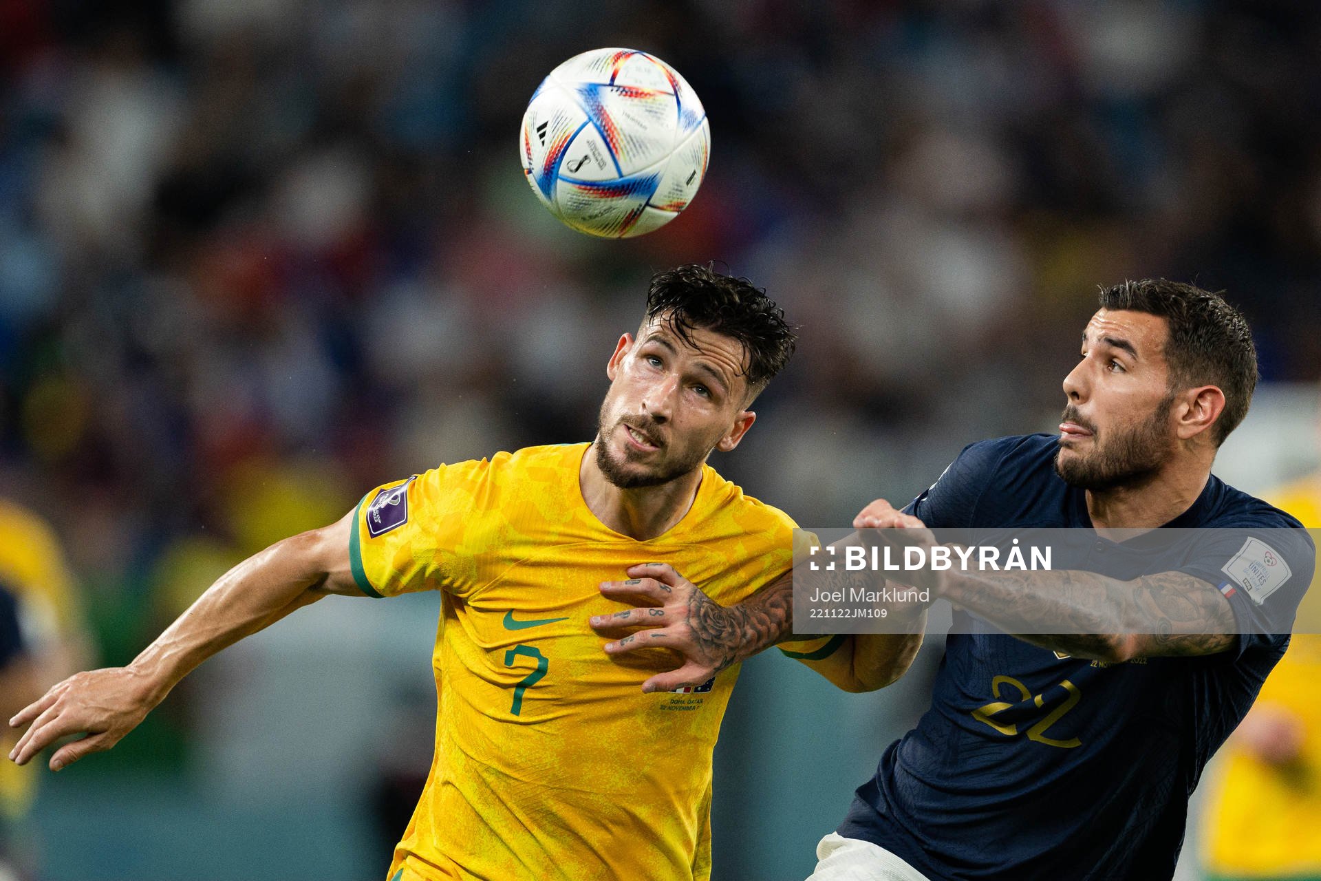 Mathew Leckie of Australia and Theo Hernandez of France during the FIFA World Cup 2022 football match between France and Australia on November 22, 2022 in Doha.