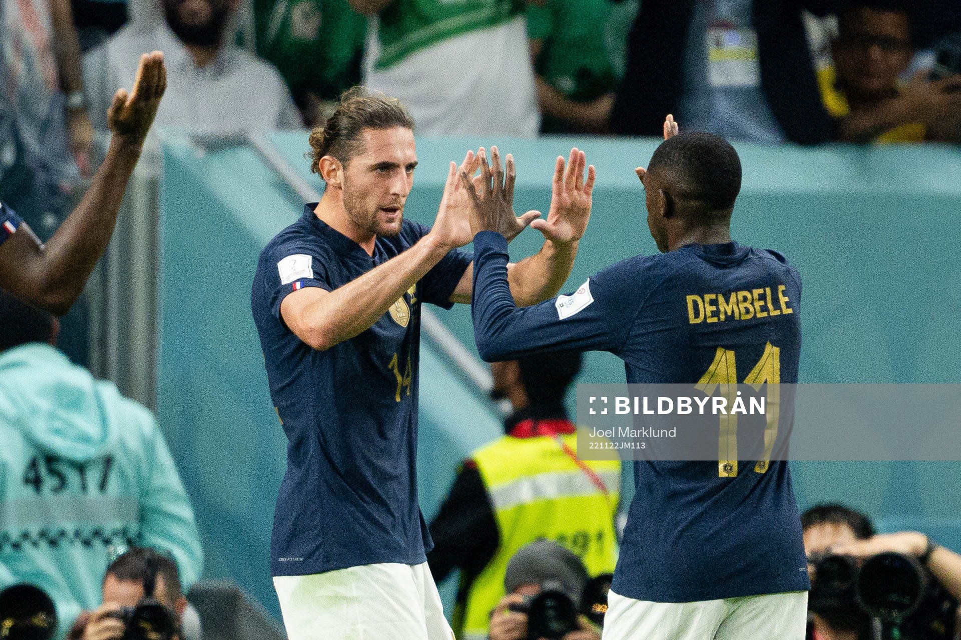 Adrien Rabiot and Ousmane Dembele of France celebrate the
