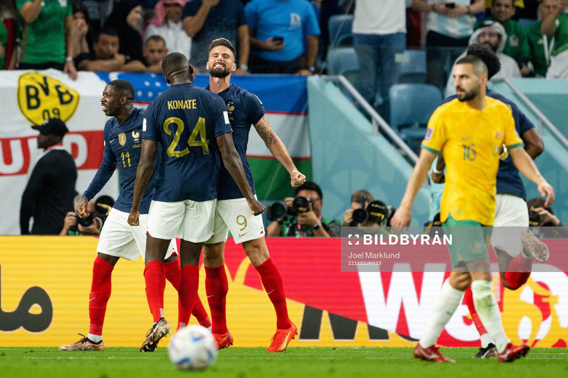 Ousmane Dembele, Ibrahima Konate and Olivier Giroud of France celebrate the 2-1 goal during the FIFA World Cup 2022 football match between France and Australia on November 22, 2022 in Doha. 