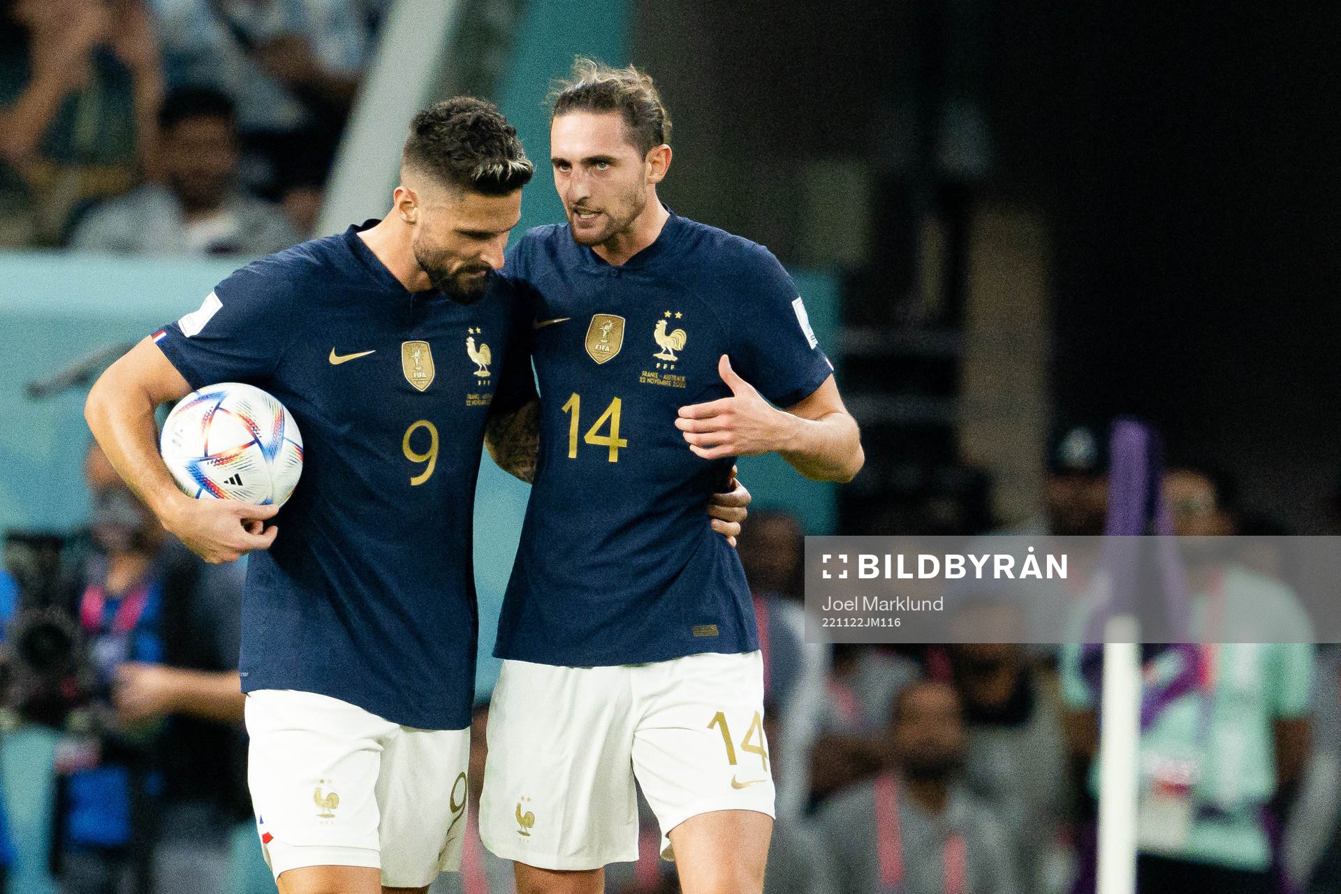 Olivier Giroud and Adrien Rabiot of France celebrate the