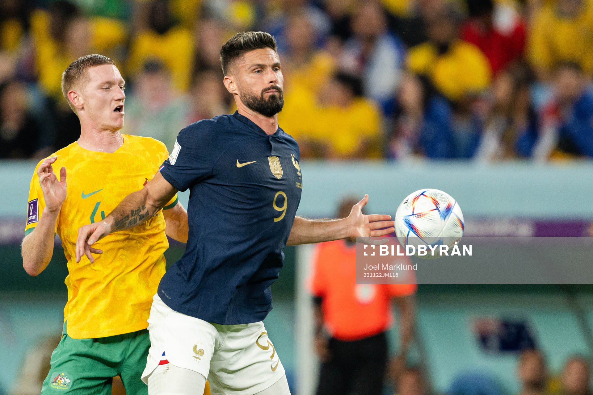 Kye Rowles of Australia and Olivier Giroud of France
