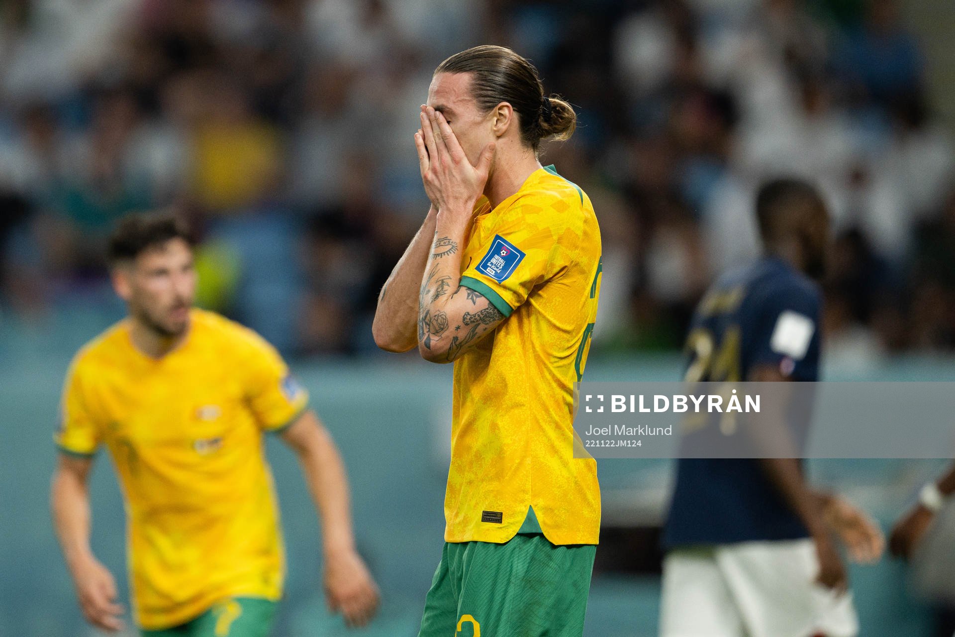 Jackson Irvine of Australia looks dejected