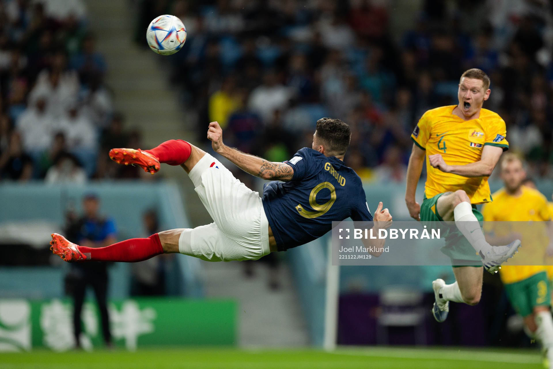 Olivier Giroud of France and Kye Rowles of Australia