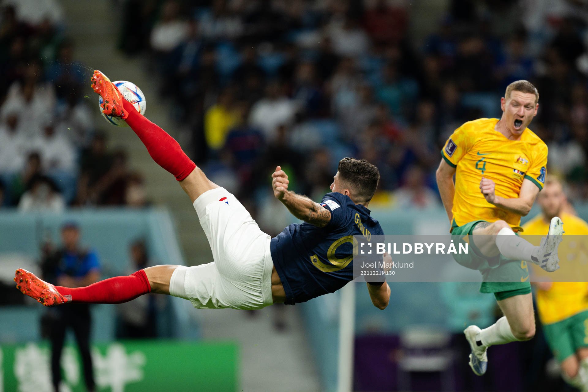 Olivier Giroud of France and Kye Rowles of Australia