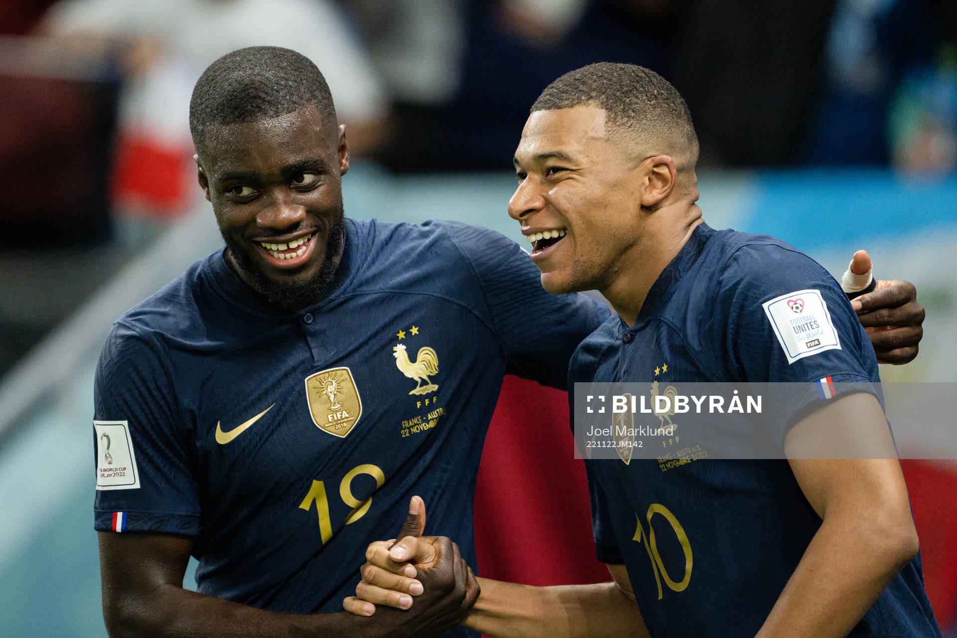 Dayot Upamecano and Kylian Mbappe of France celebrate the