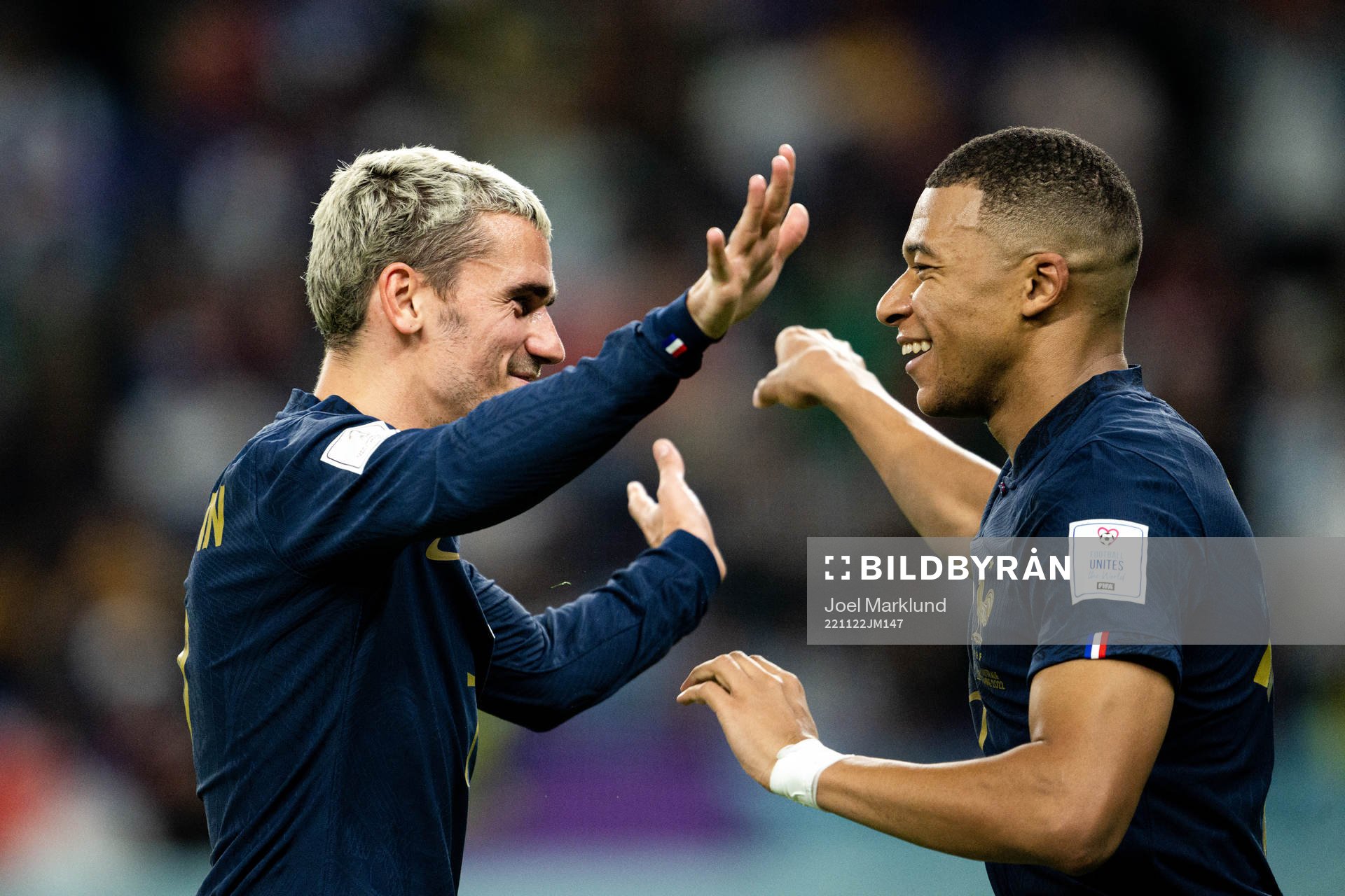 Antoine Griezmann and Kylian Mbappe of France celebrate the