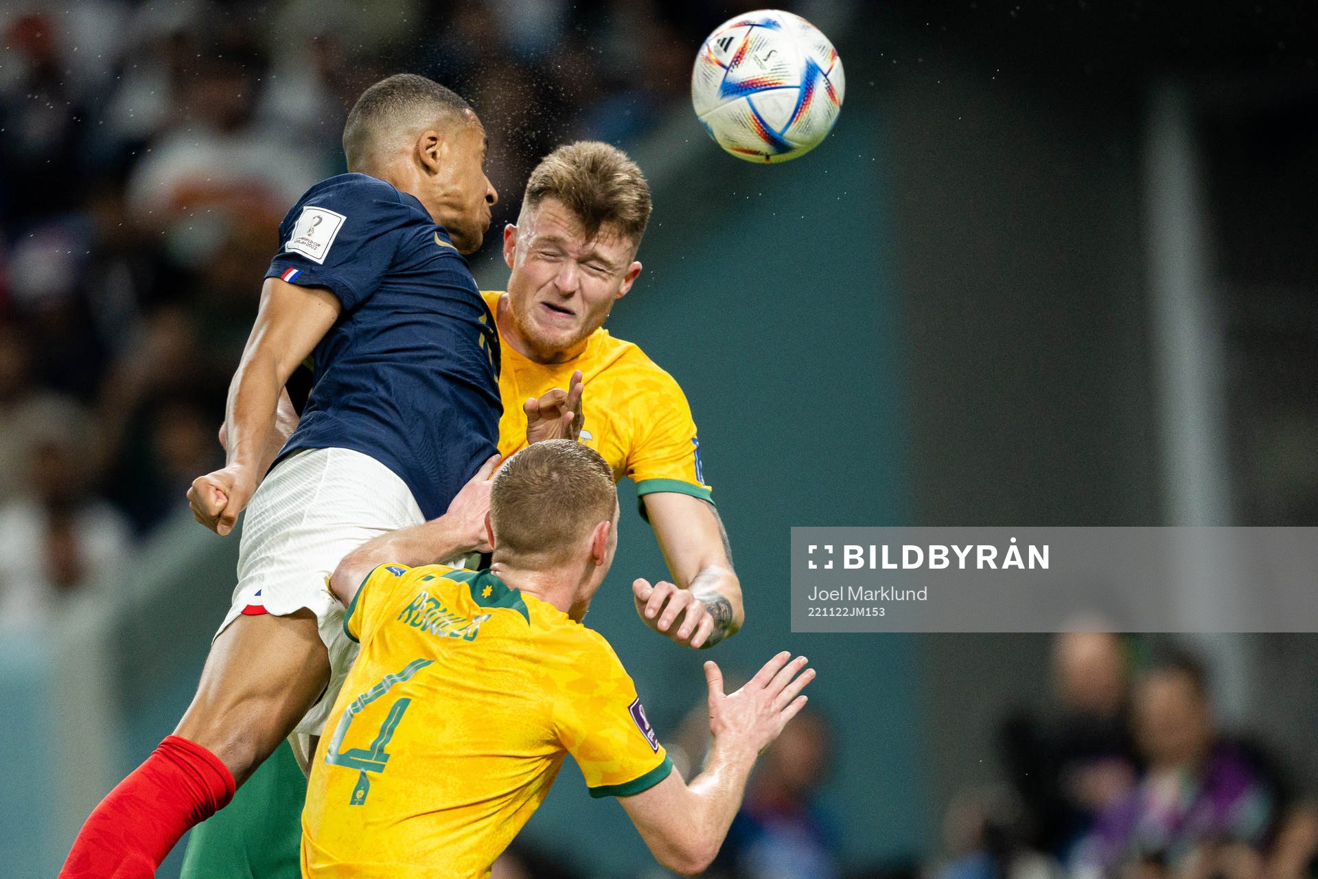 Kylian Mbappe of France scores the 3-1 goal behind Kye Rowles and Harry Souttar of Australia during the FIFA World Cup 2022 football match between France and Australia on November 22, 2022 in Doha.