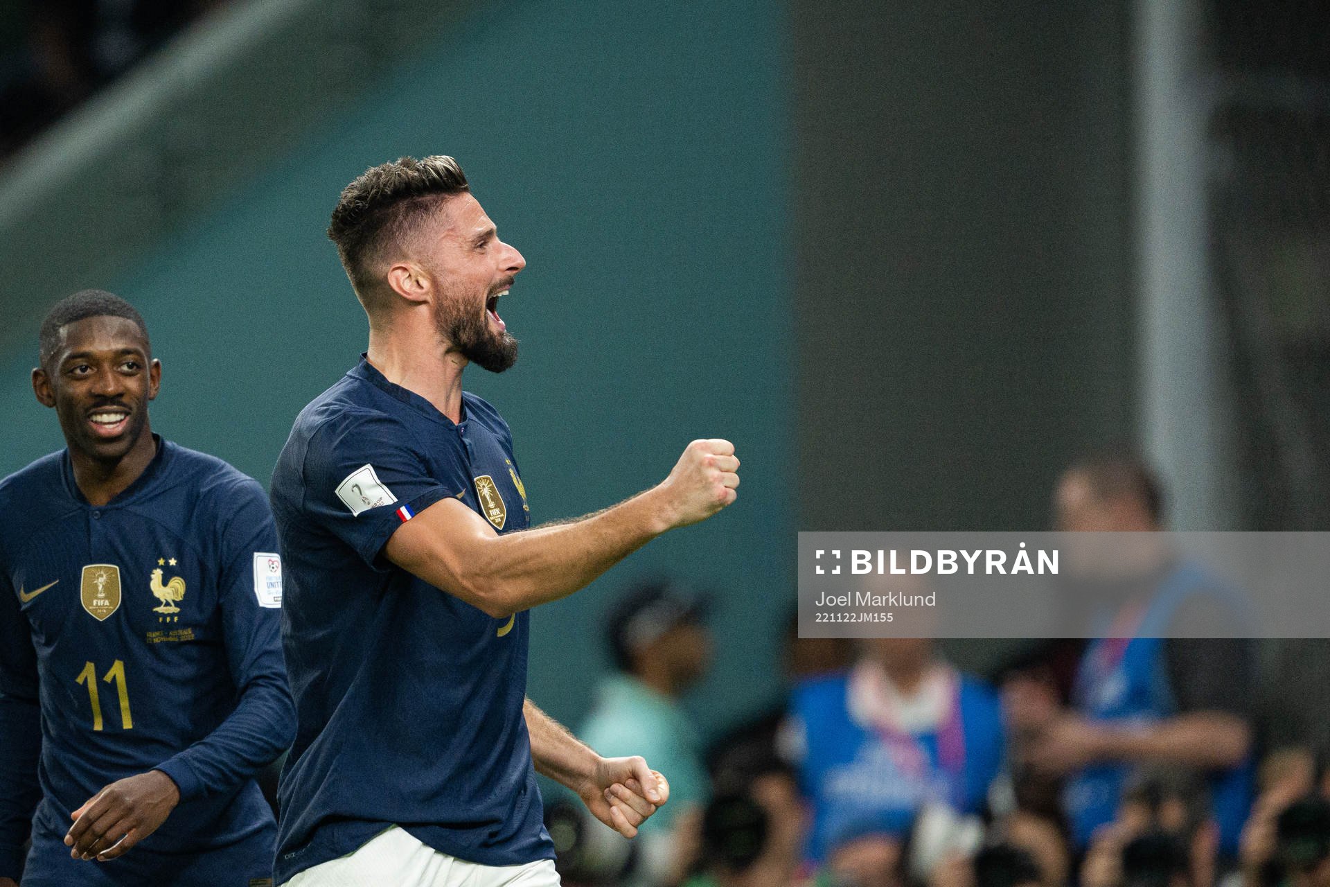 Ousmane Dembele and Olivier Giroud of France celebrate the