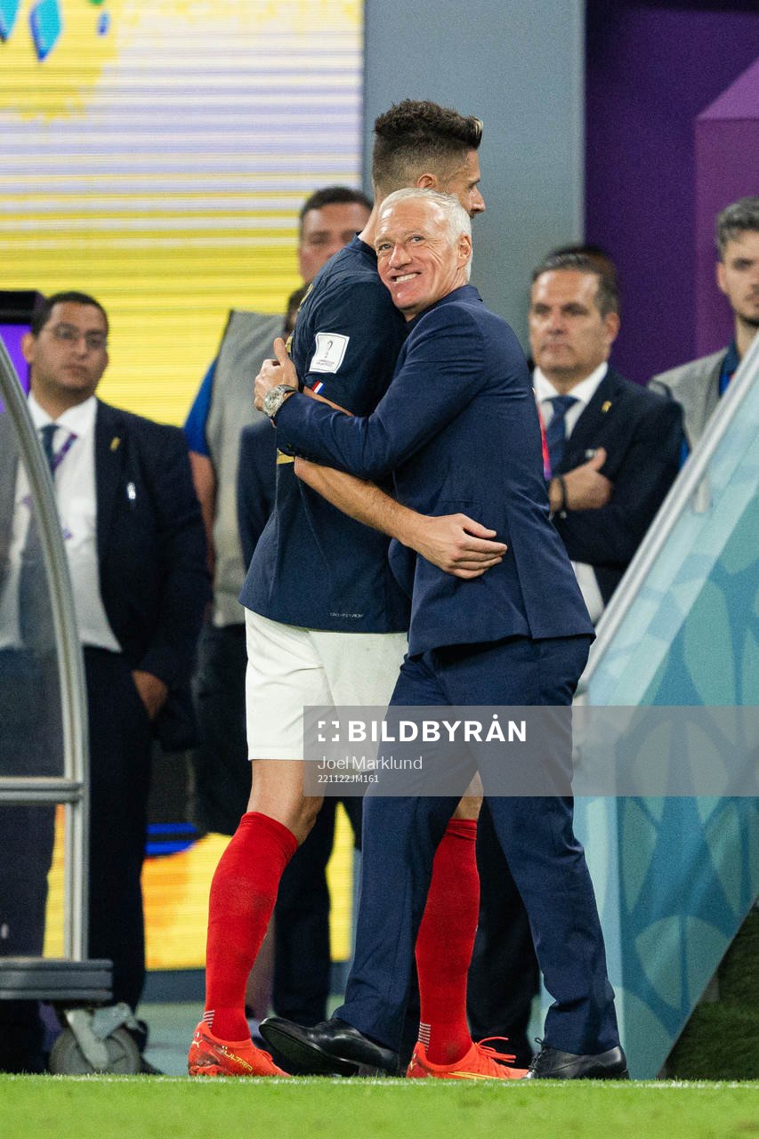 Olivier Giroud and head coach Didier Deschamps of France