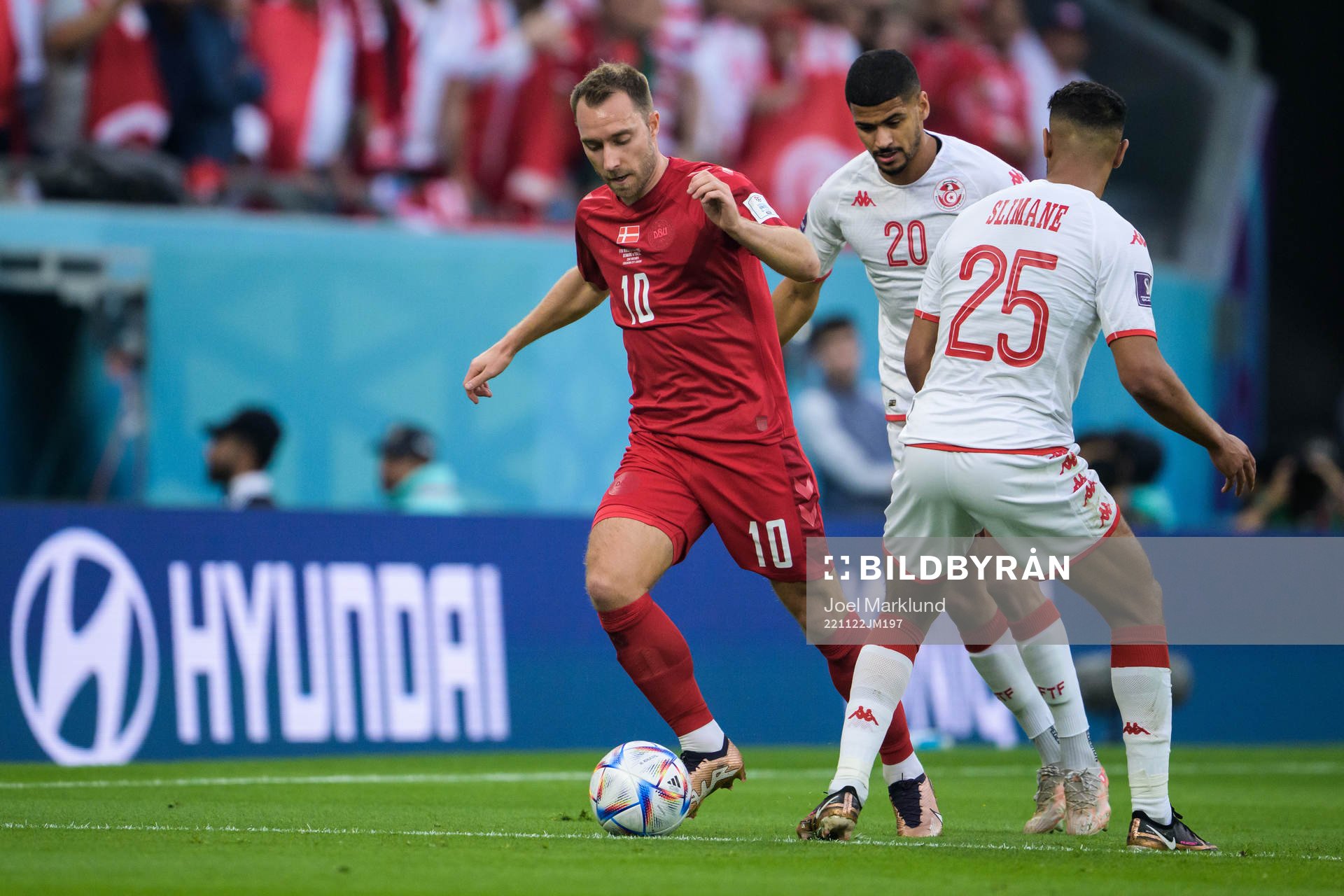 Christian Eriksen of Denmark against Mohamed Drager and