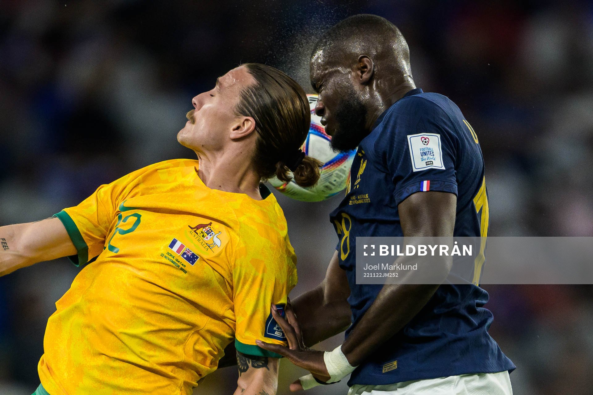 Jackson Irvine of Australia and Dayot Upamecano of France