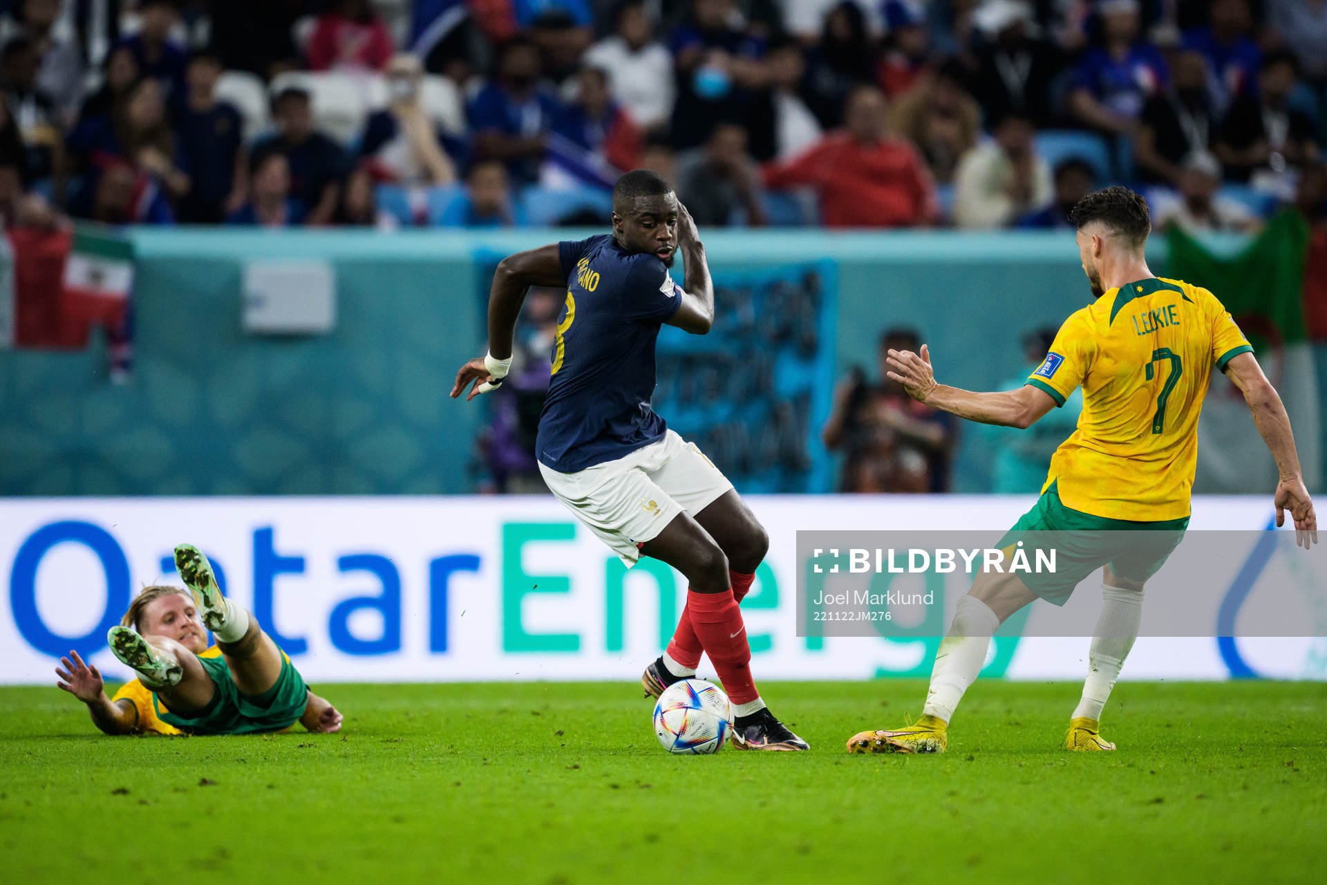 Jason Cummings and Mathew Leckie of Australia in action