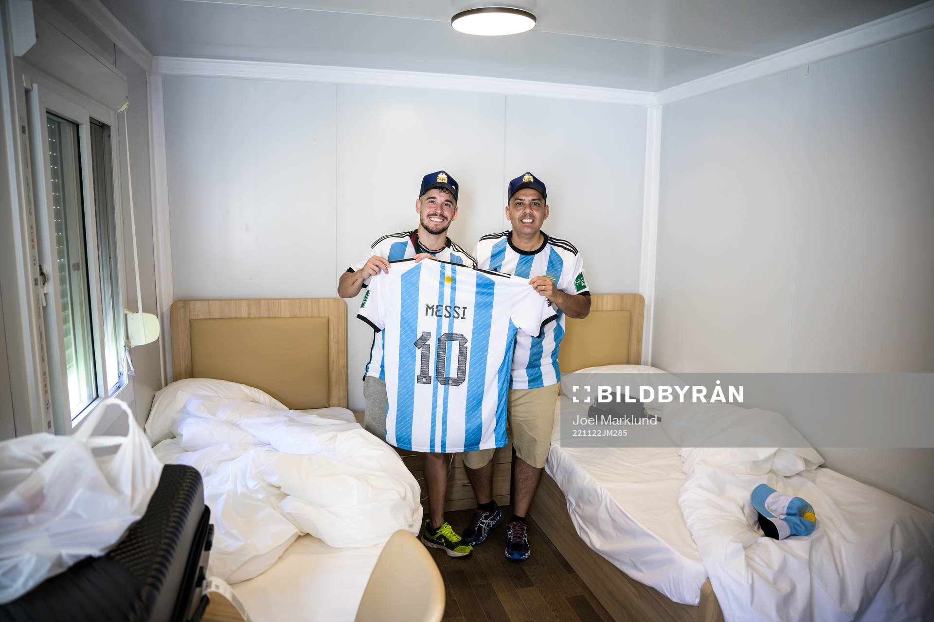 Nico Lorenzonn and Raul from Argentina pose with a Messi