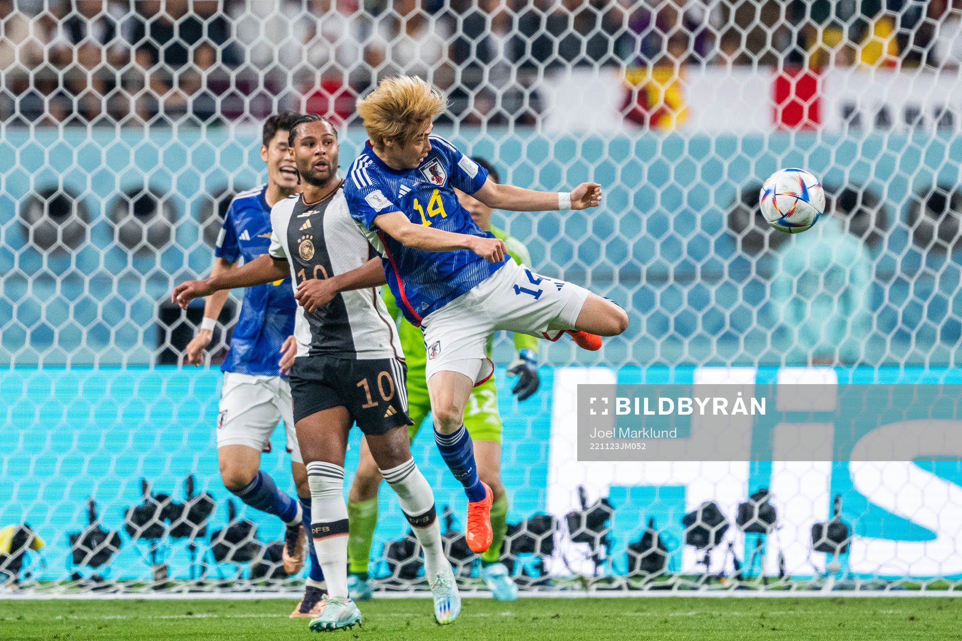 Serge Gnabry of Germany  with Hiroki Sakai and Junya Ito of