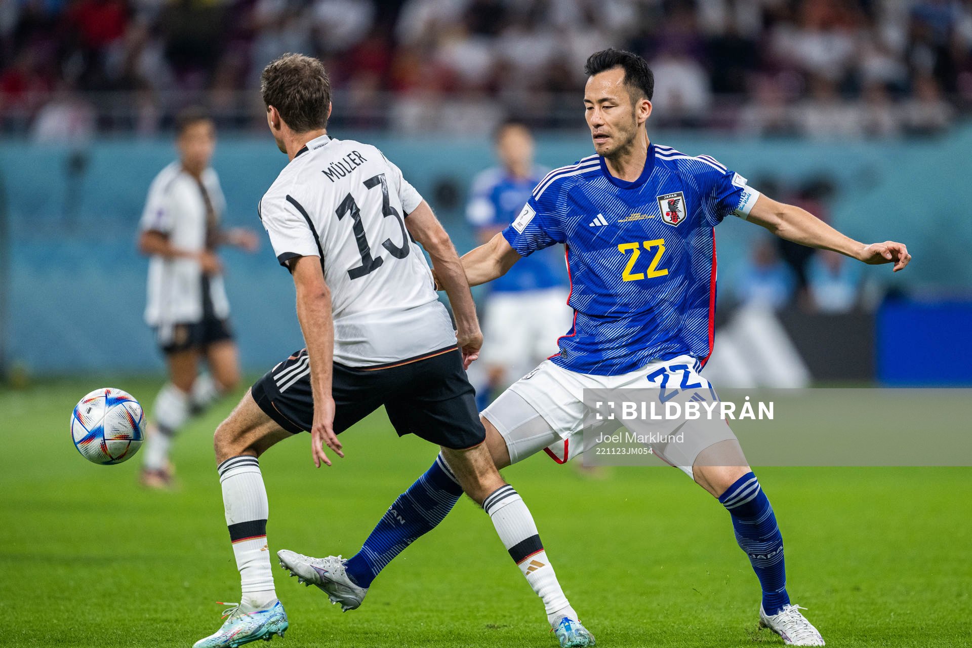 Thomas Müller of Germany and Maya Yoshida of Japan during the FIFA World Cup 2022 football match between Germany and Japan on November 23, 2022 in Doha.