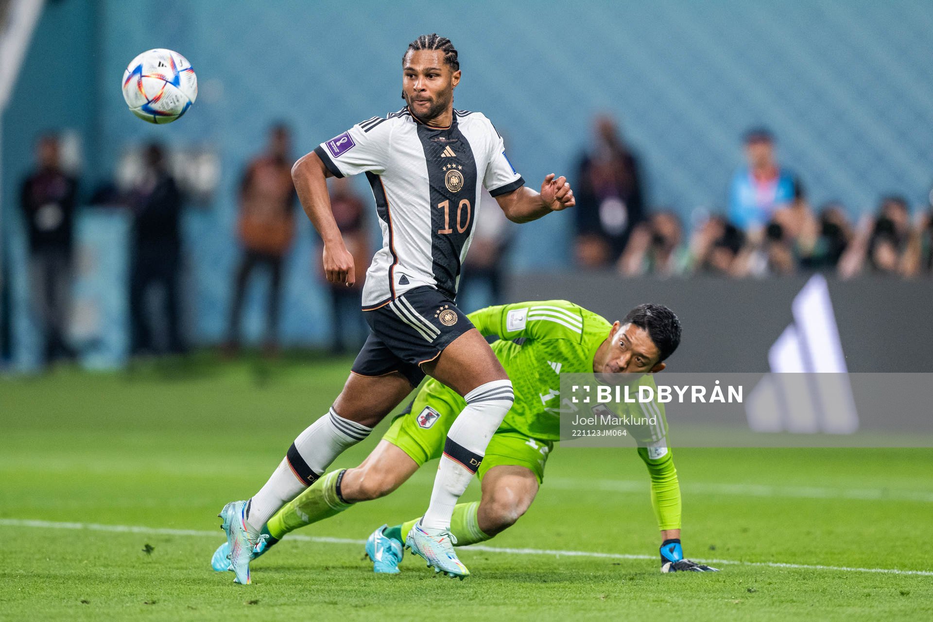 Serge Gnabry of Germany and goalkeeper Shuichi Gonda of