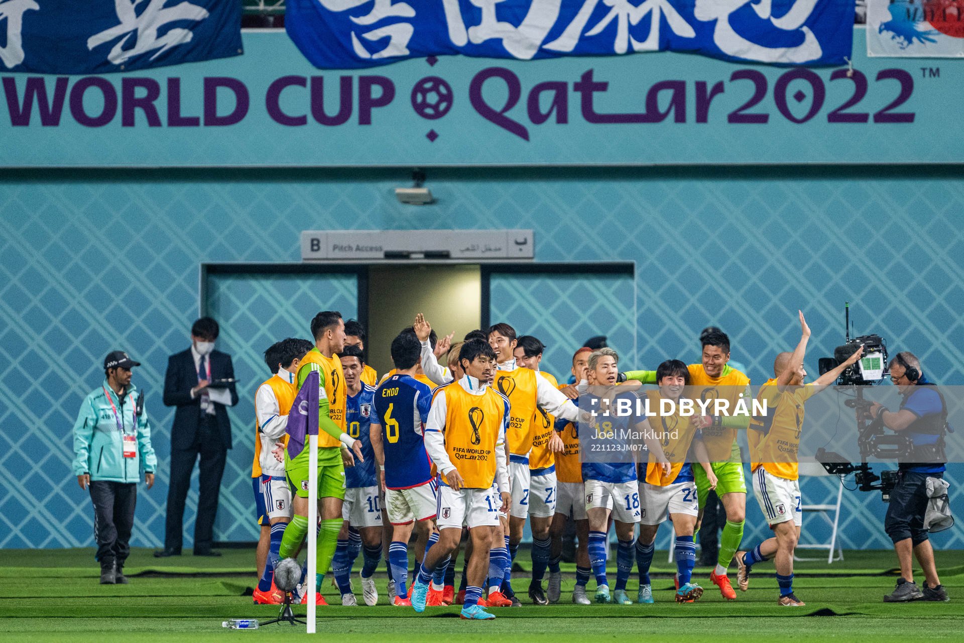 Takuma Asano of Japan celebrates