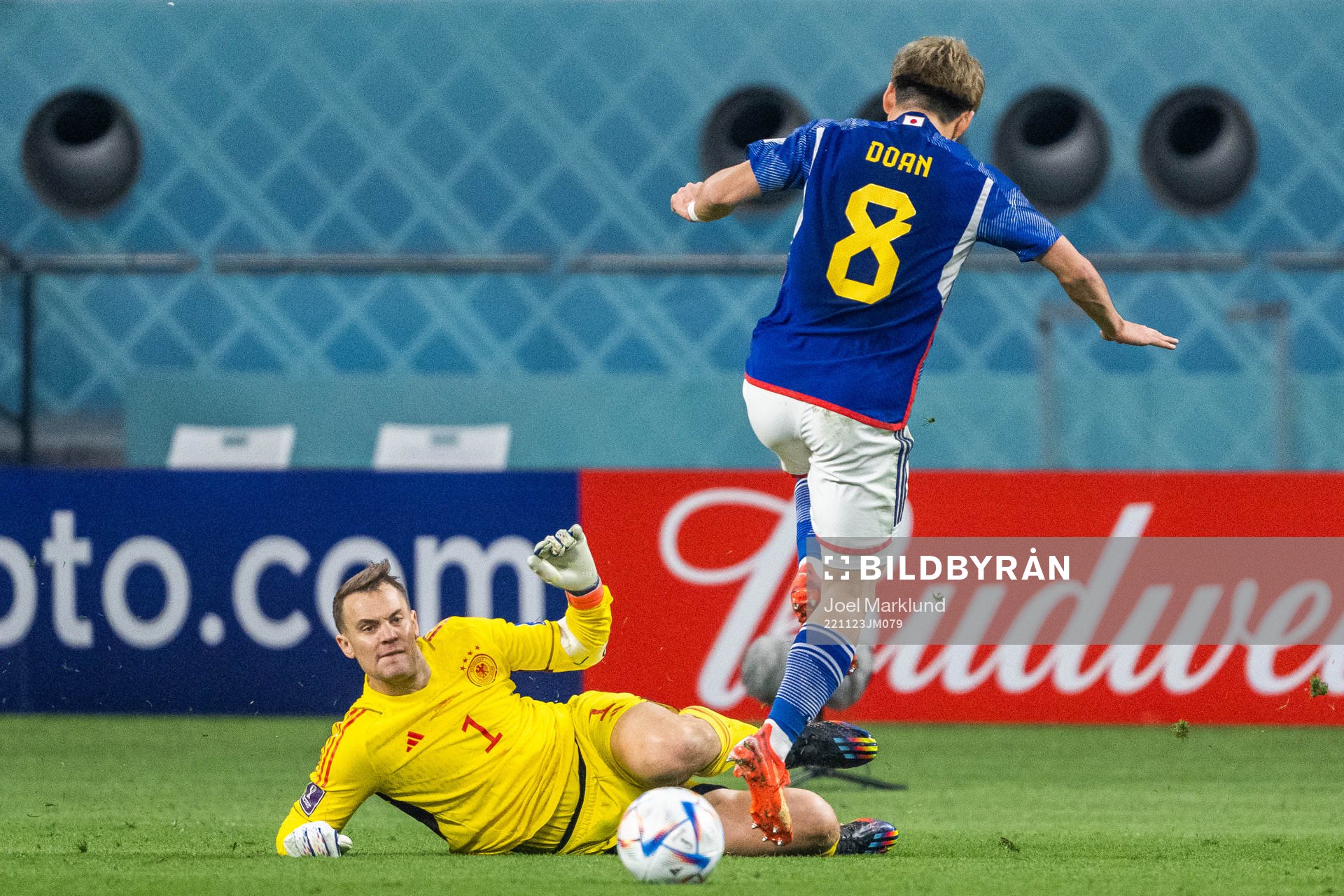 goalkeeper Manuel Neuer of Germany and Ritsu Doan of Japan