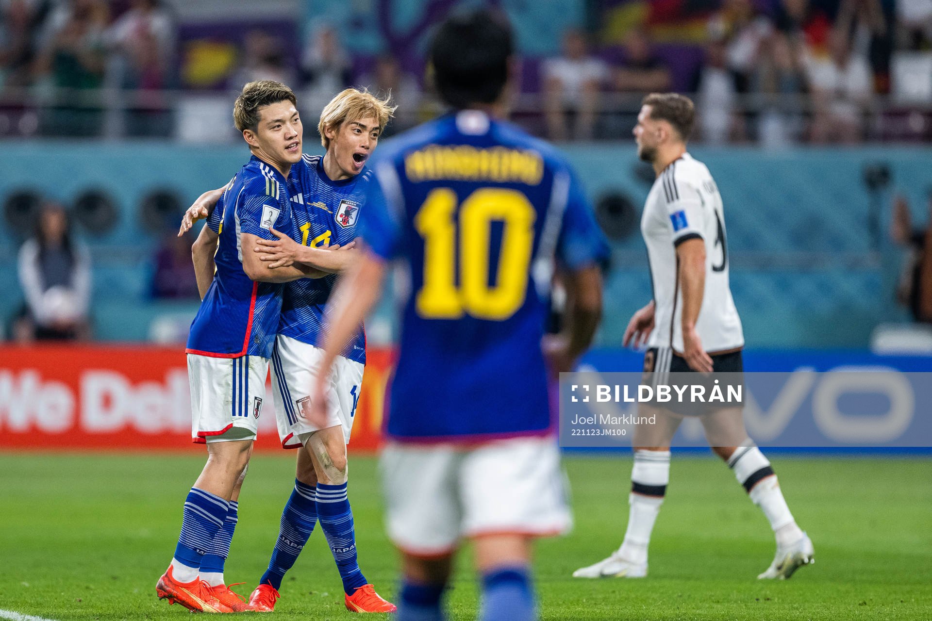 Ritsu Doan and Junya Ito of Japan celebrate