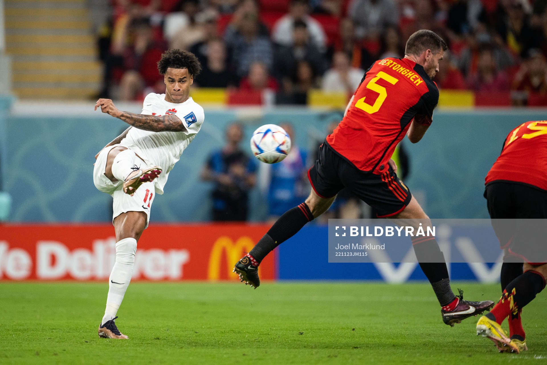 Tajon Buchanan of Canada and Jan Vertonghen of Belgium