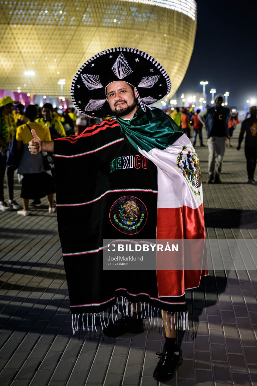 A Mexican fan poses for a portrait