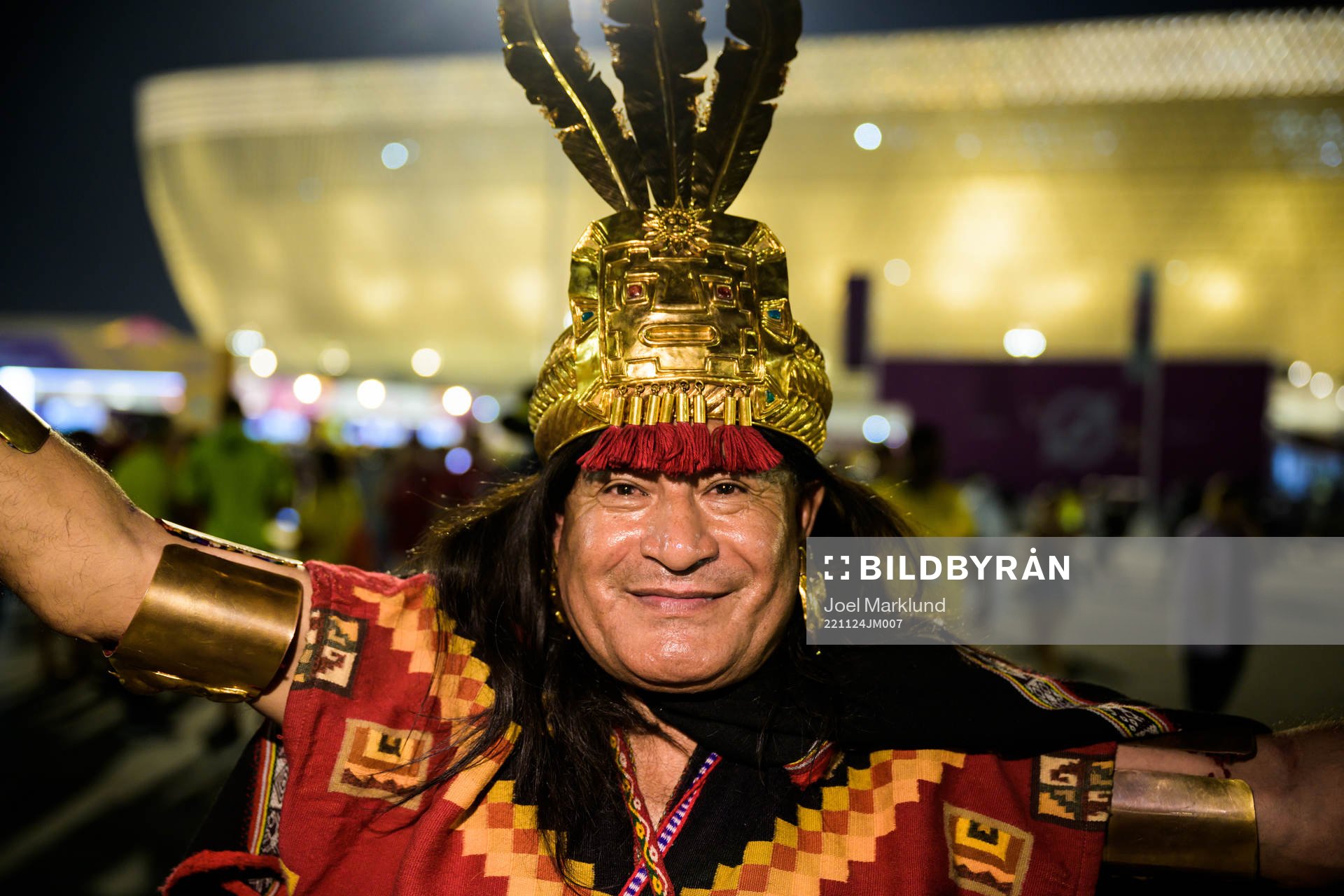 A fan poses for a portrait