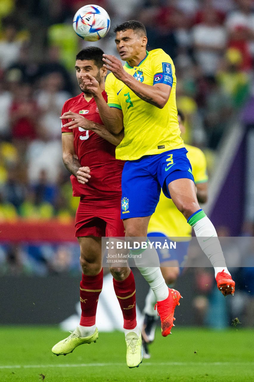 Aleksandar Mitrovic of Serbia and Thiago Silvaof Brazil