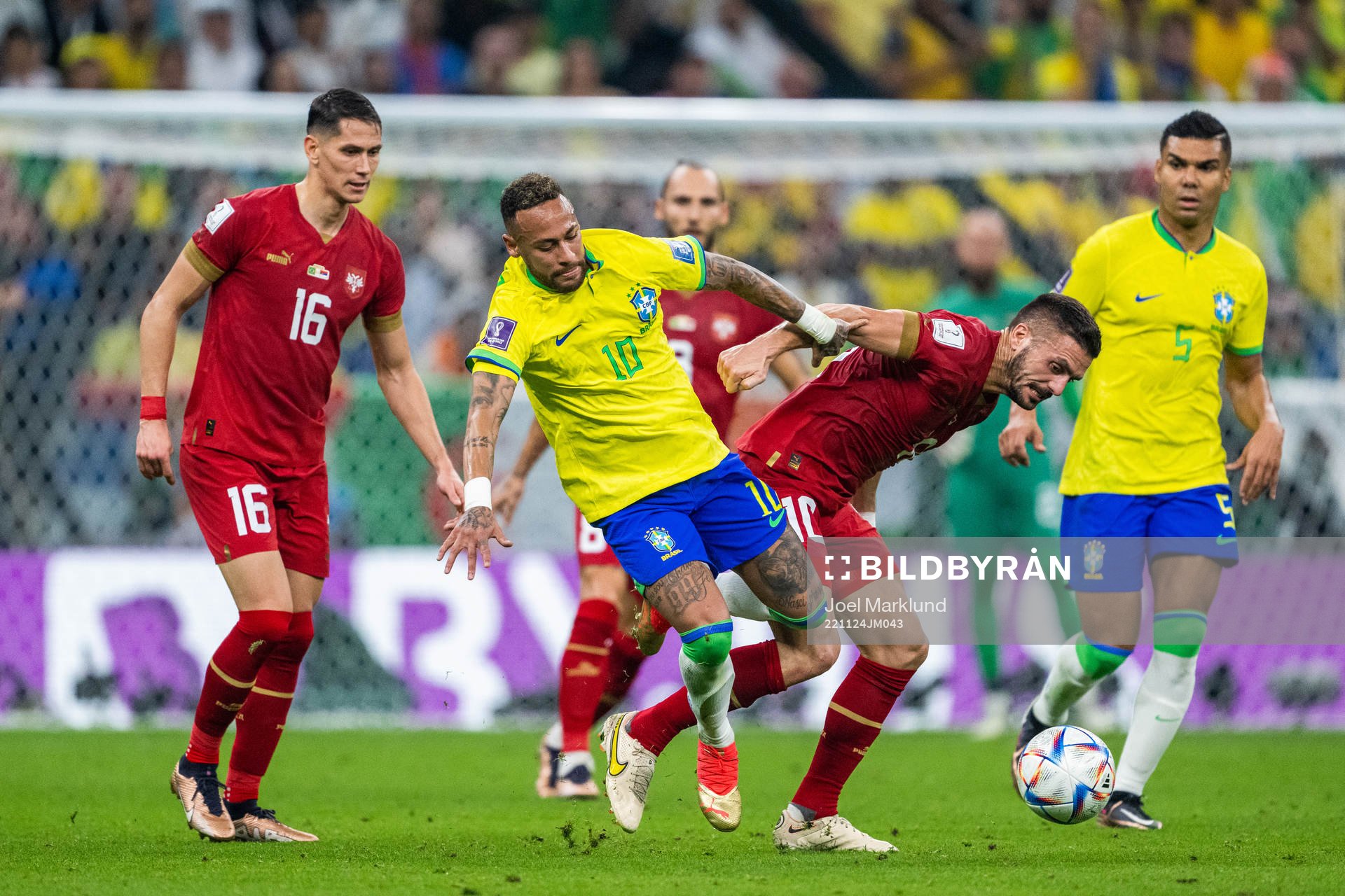 Sasa Lukic and Dusan Tadic of Serbia compete for the ball