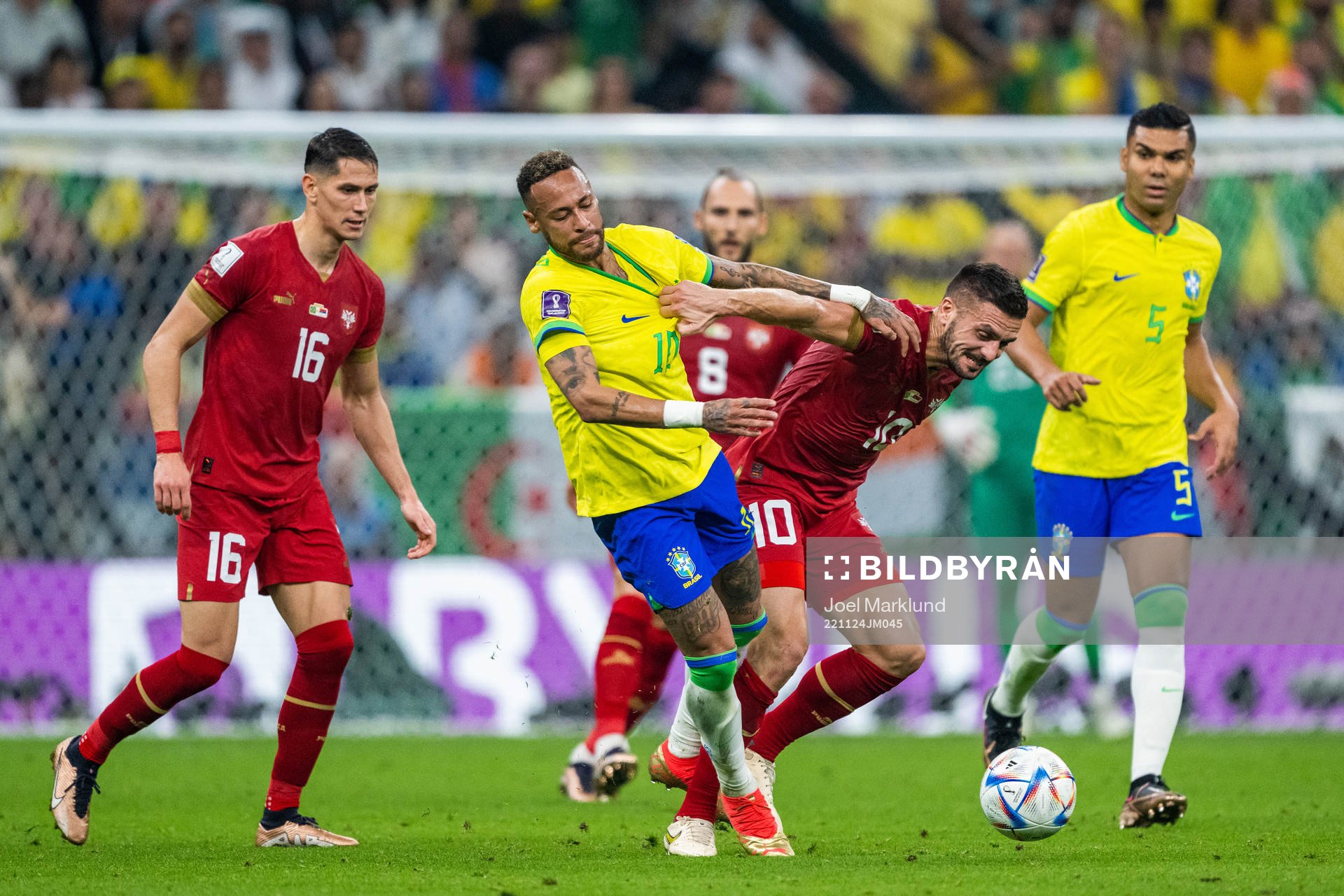 Sasa Lukic and Dusan Tadic of Serbia compete for the ball