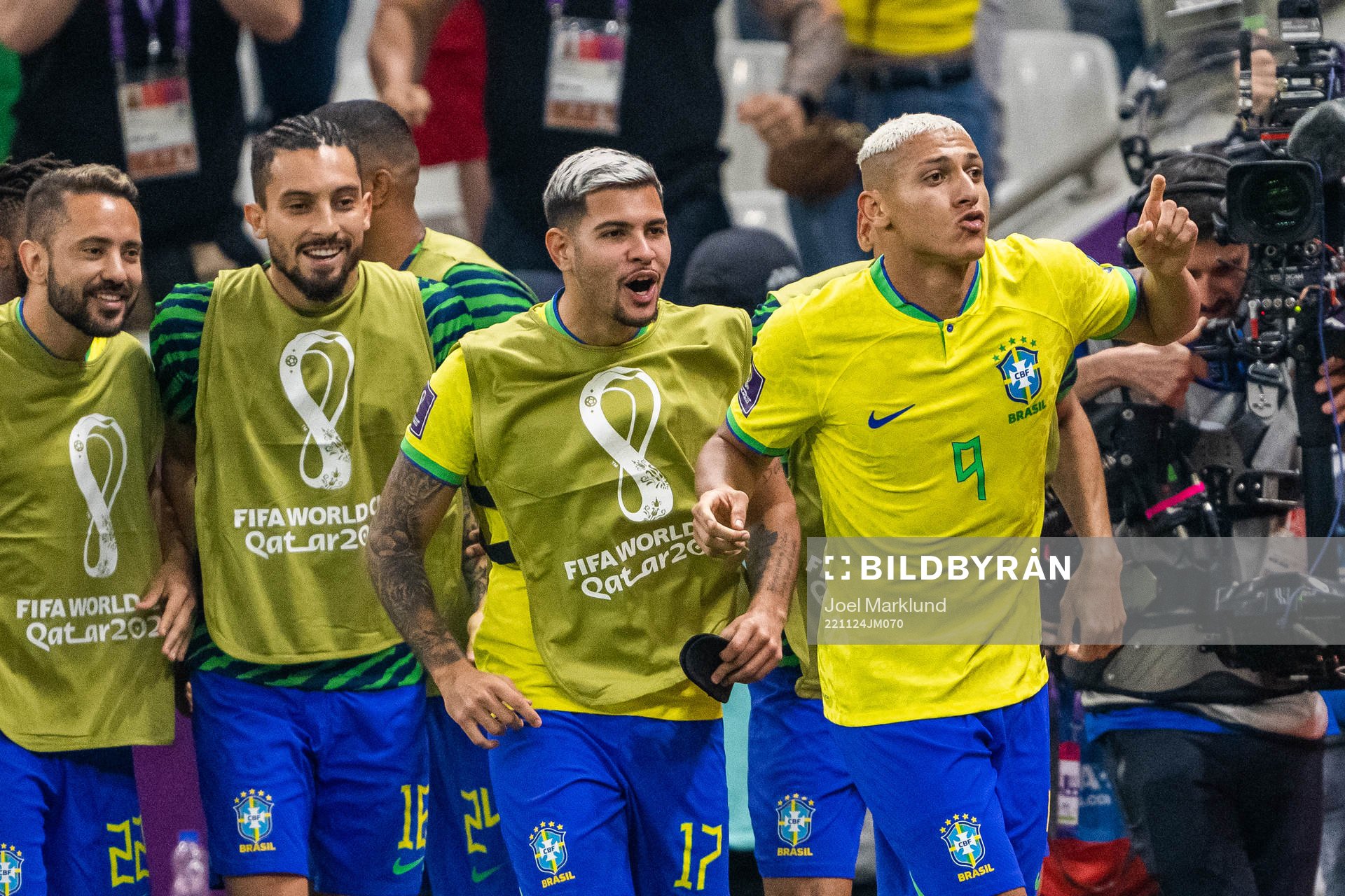Richarlison of Brazil celebrates with team mates