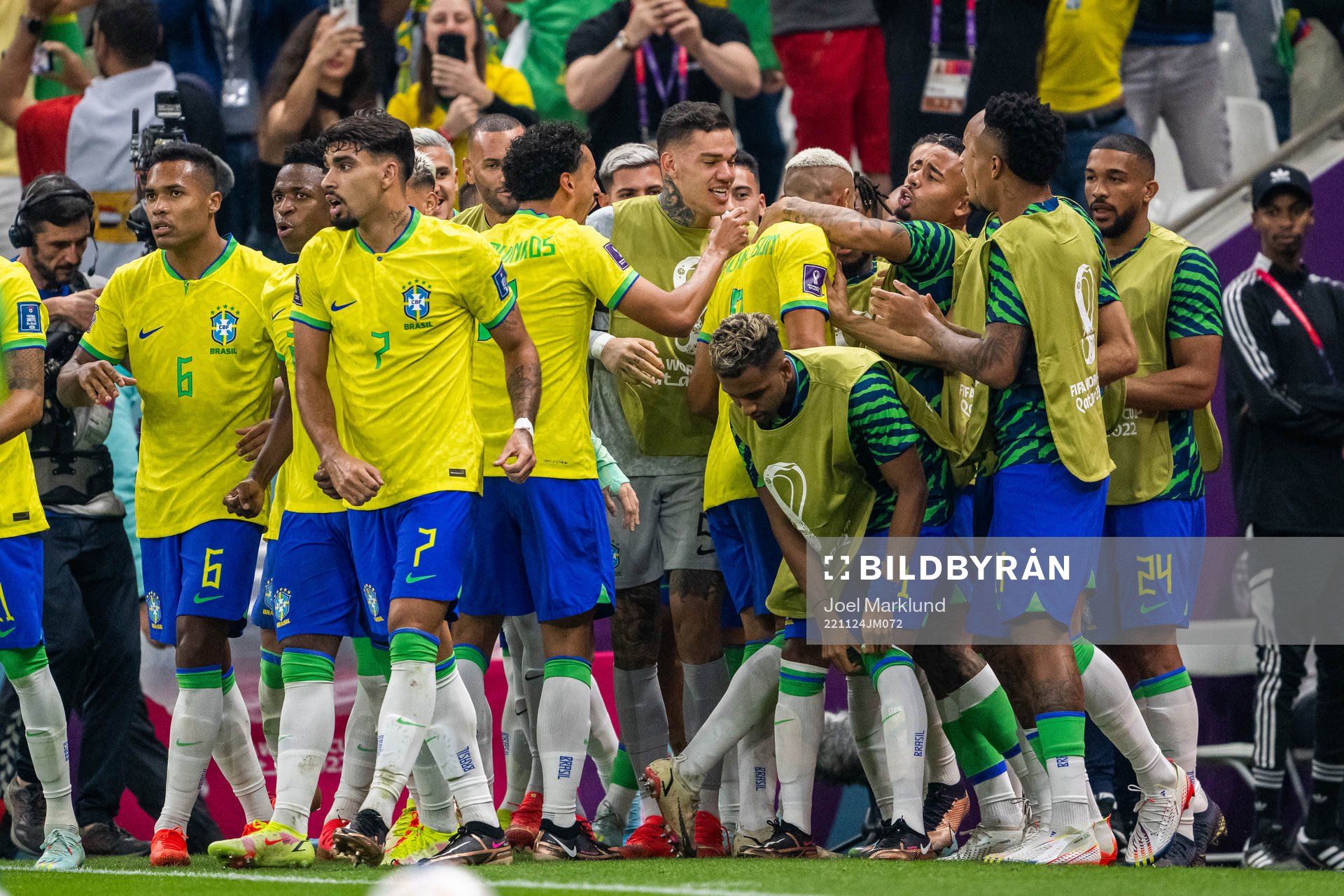 Richarlison of Brazil celebrates with team mates